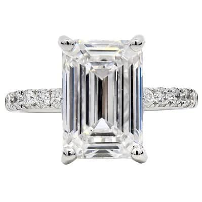 A PLATINUM EMERALD CUT LAB GROWN DIAMOND RING. CENTRAL STONE 4.10ct, SIDE STONES 0.53CTW. COLOR D, CLARITY VS1. IGI CERTIFIED. CERT NO- LG744519007. TOTAL DIAMOND WEIGHT: 4.63ct. TOTAL WEIGHT 5.06gms. SIZE L. Ref U4534