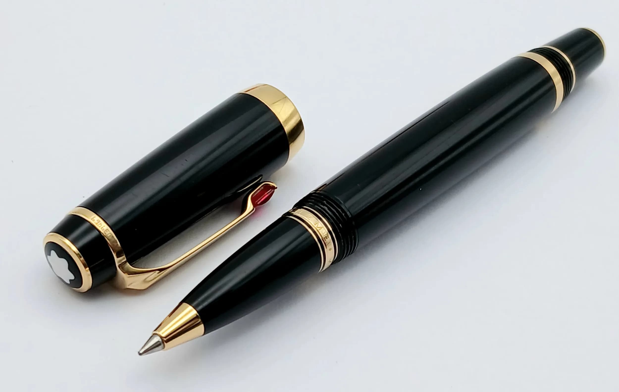A Montblanc Boheme Black Resin and Gold-Plated Rollerball Pen. 12cm. TTB065.