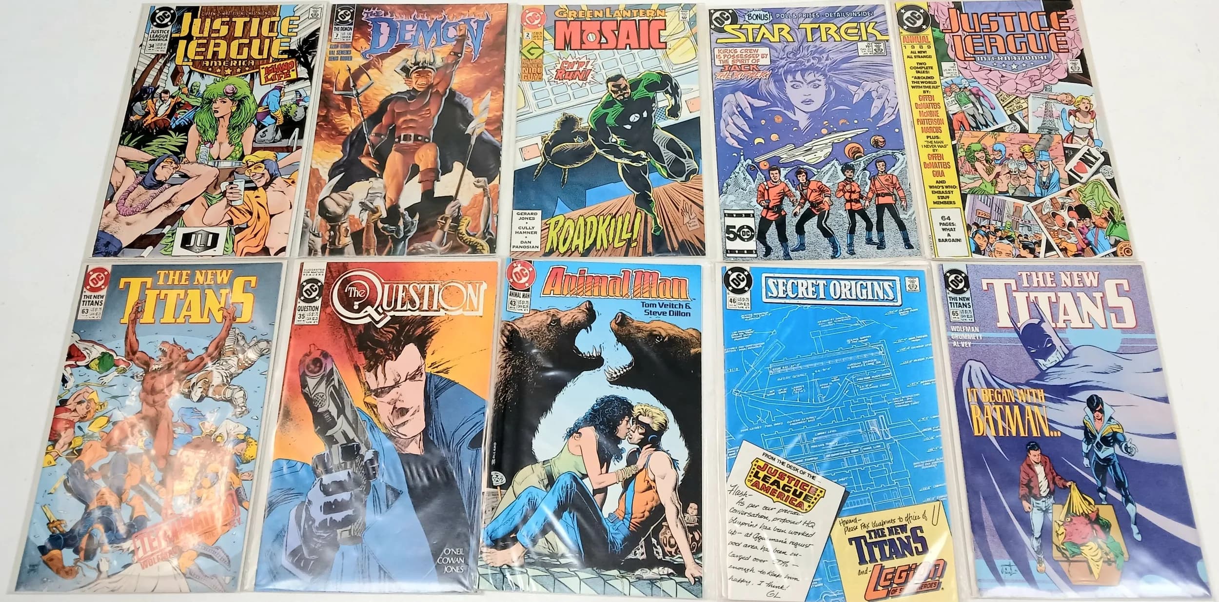 Ten DC Mixed Comics. All plastic wrapped. Please refer to photos for finer details.