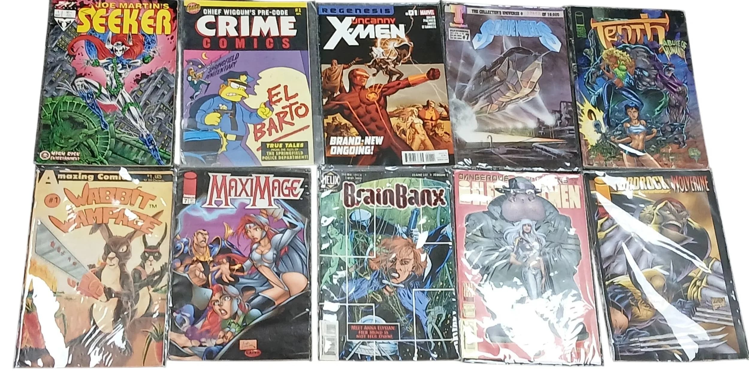 Ten Mixed Comics - Some Eclectic. All plastic wrapped. Please refer to photos for finer details.