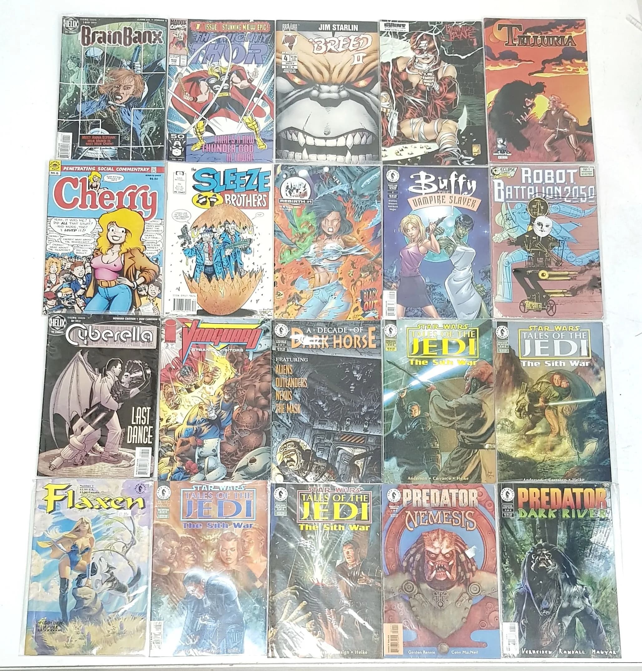 18 Mixed Comics - Some Eclectic. All plastic wrapped. Please refer to photos for finer details.