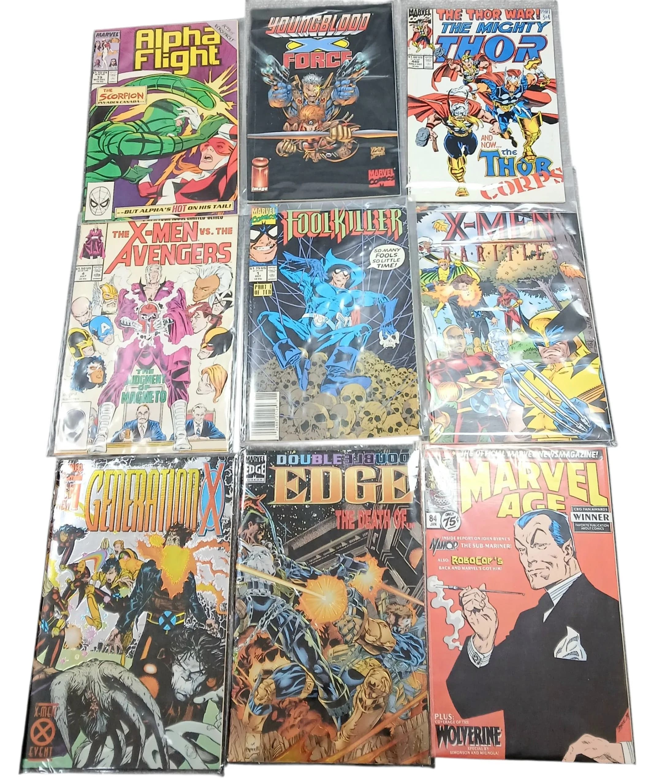 Nine Marvel Mixed Comics. All plastic wrapped. Please refer to photos for finer details.