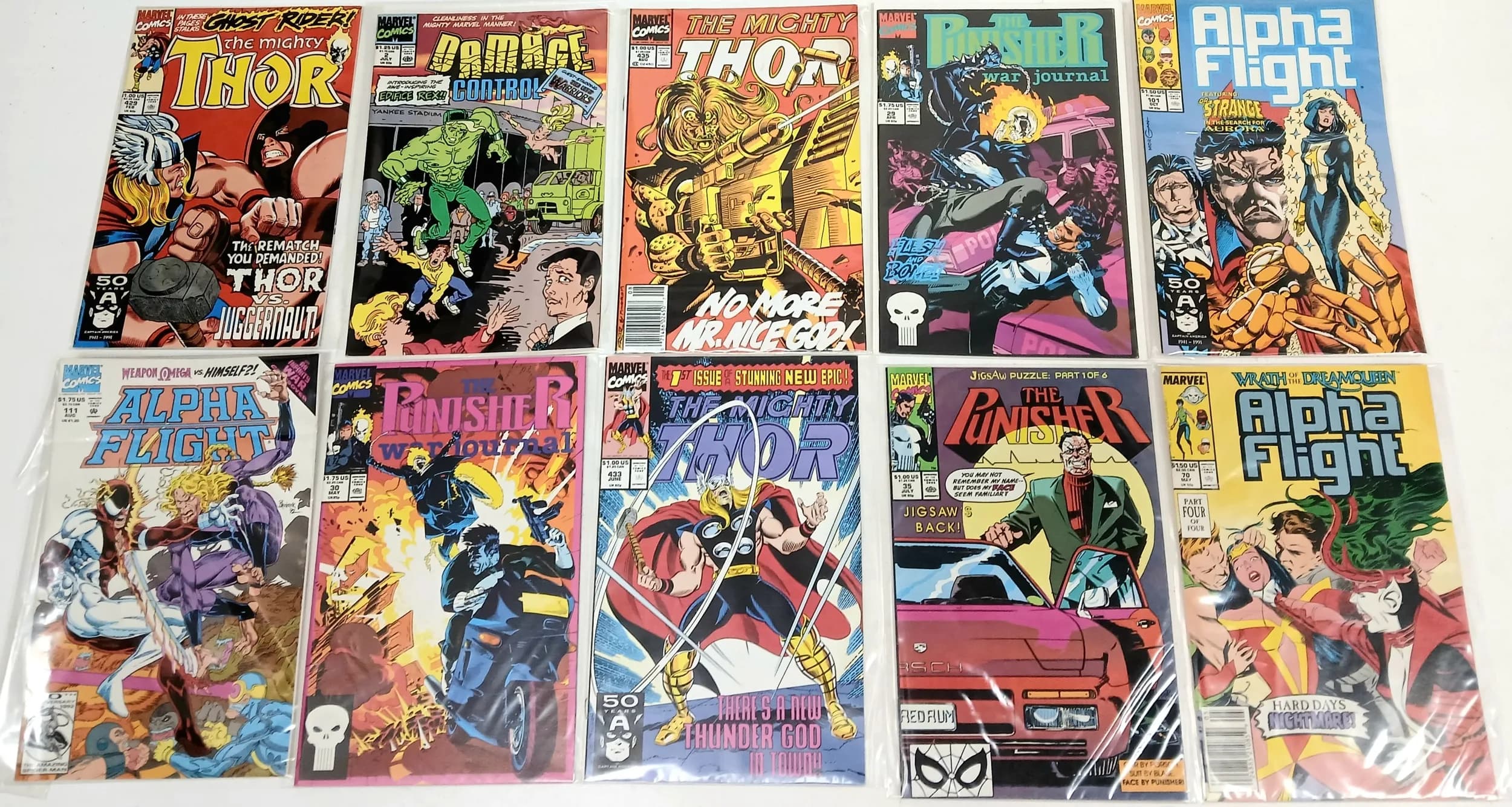 Ten Marvel Mixed Comics. All plastic wrapped. Please refer to photos for finer details.