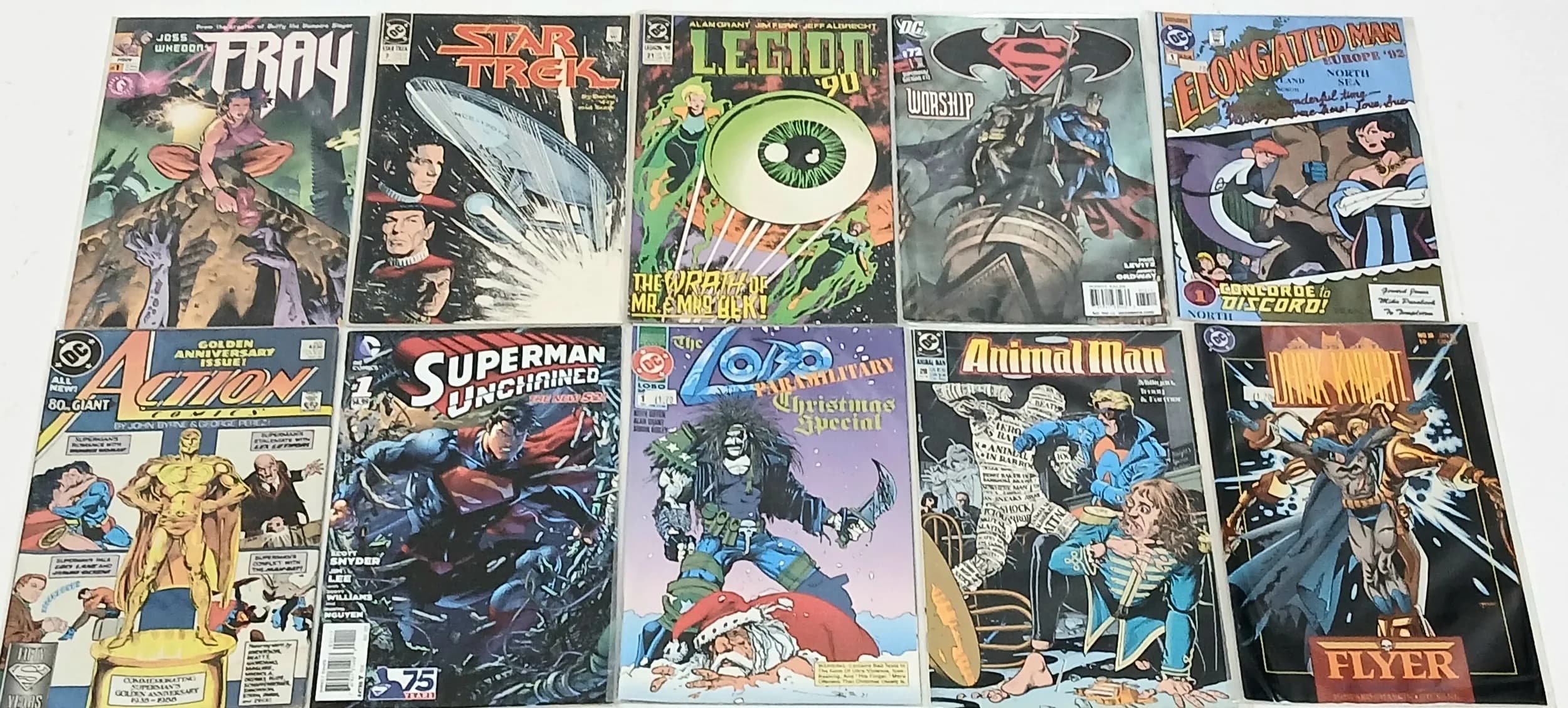 Ten DC Mixed Comics. All plastic wrapped. Please refer to photos for finer details.