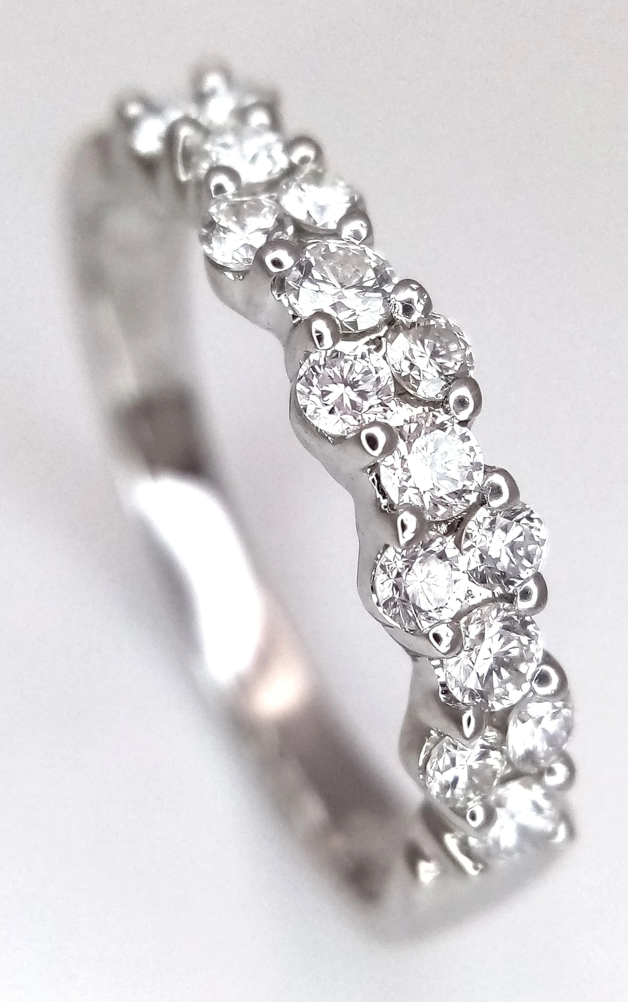 AN 18K WHITE GOLD, DIAMOND SET RING. 0.35CTW. 2.5G, SIZE K. SC 5111