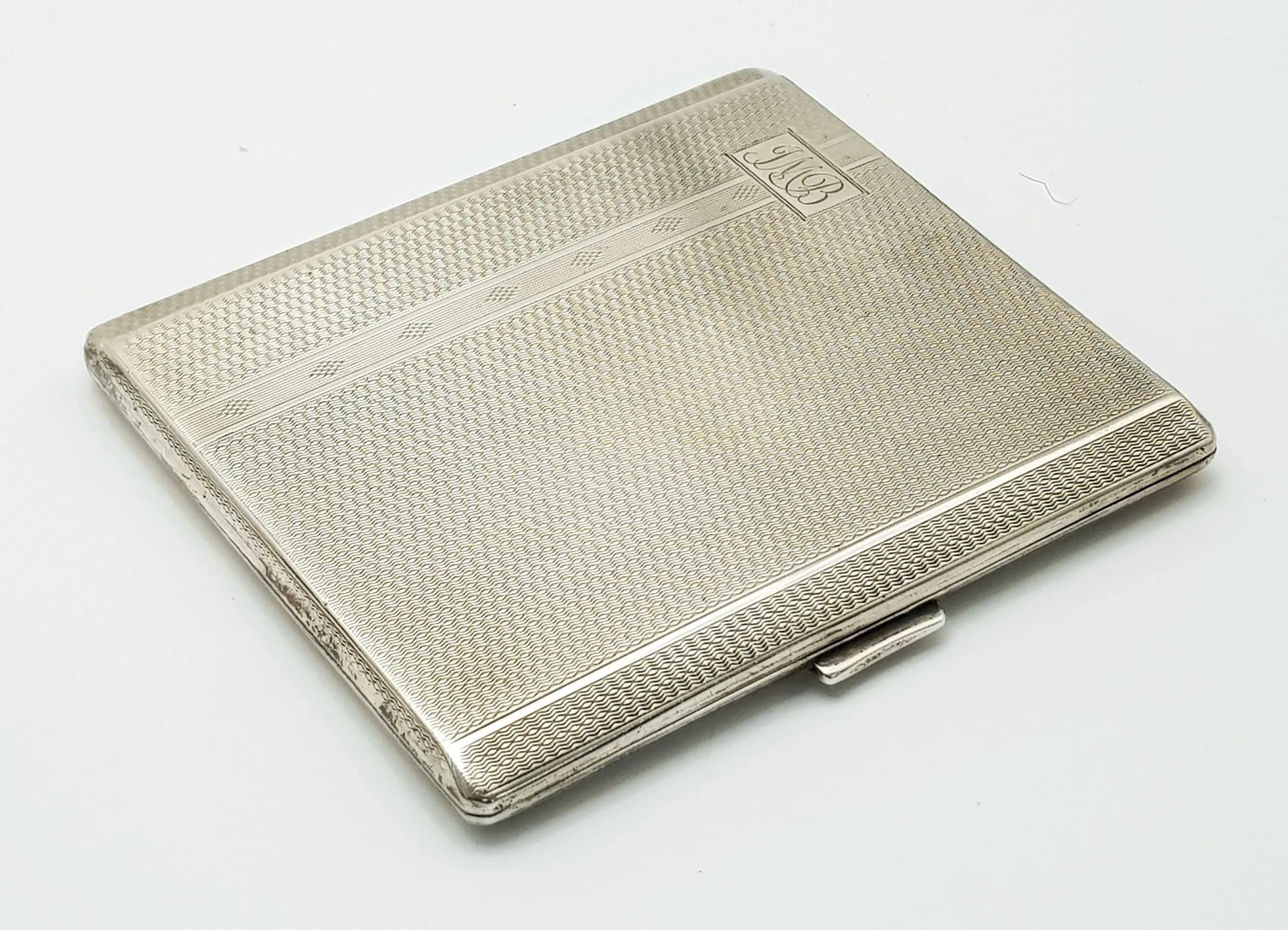 Antique ART DECO SILVER CIGARETTE CASE. Beautiful Engine Turned Design. Full UK hallmark for Birmingham 1933. Excellent condition. 128 Grams.