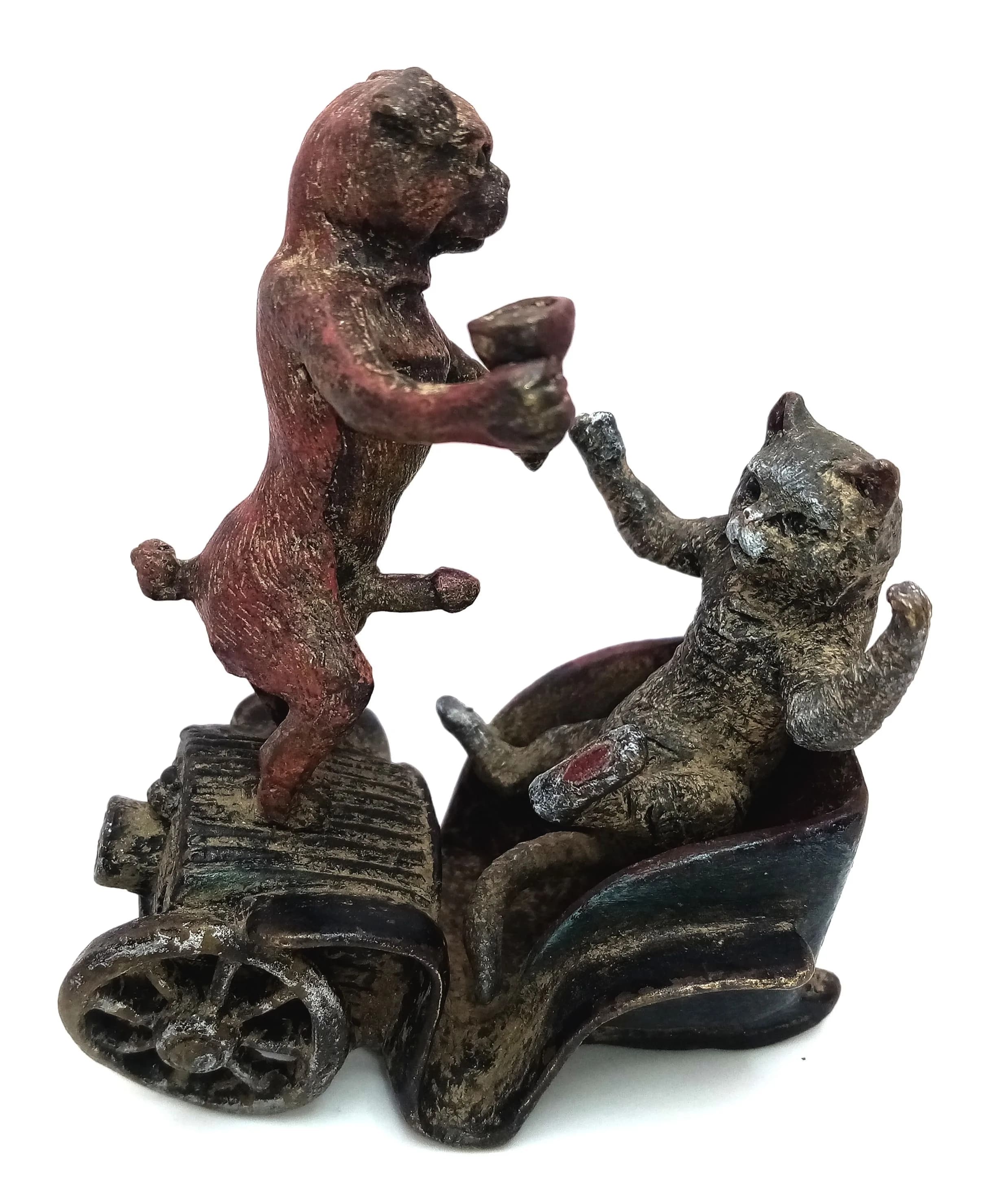A Cold Painted Bronze by Franz Bergman (Austrian, 1861-1936). A drunken fight between a pug and a cat. 7.5cm length x 9.5cm height x 5cm width.