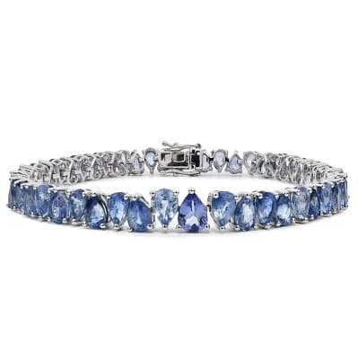 A 9K White Gold Sapphire Bracelet. Fifty Two Pear Shaped Sapphires, Weighing Total 27.24ct. Total Bracelet Weight 20.65g. Ref: U3767