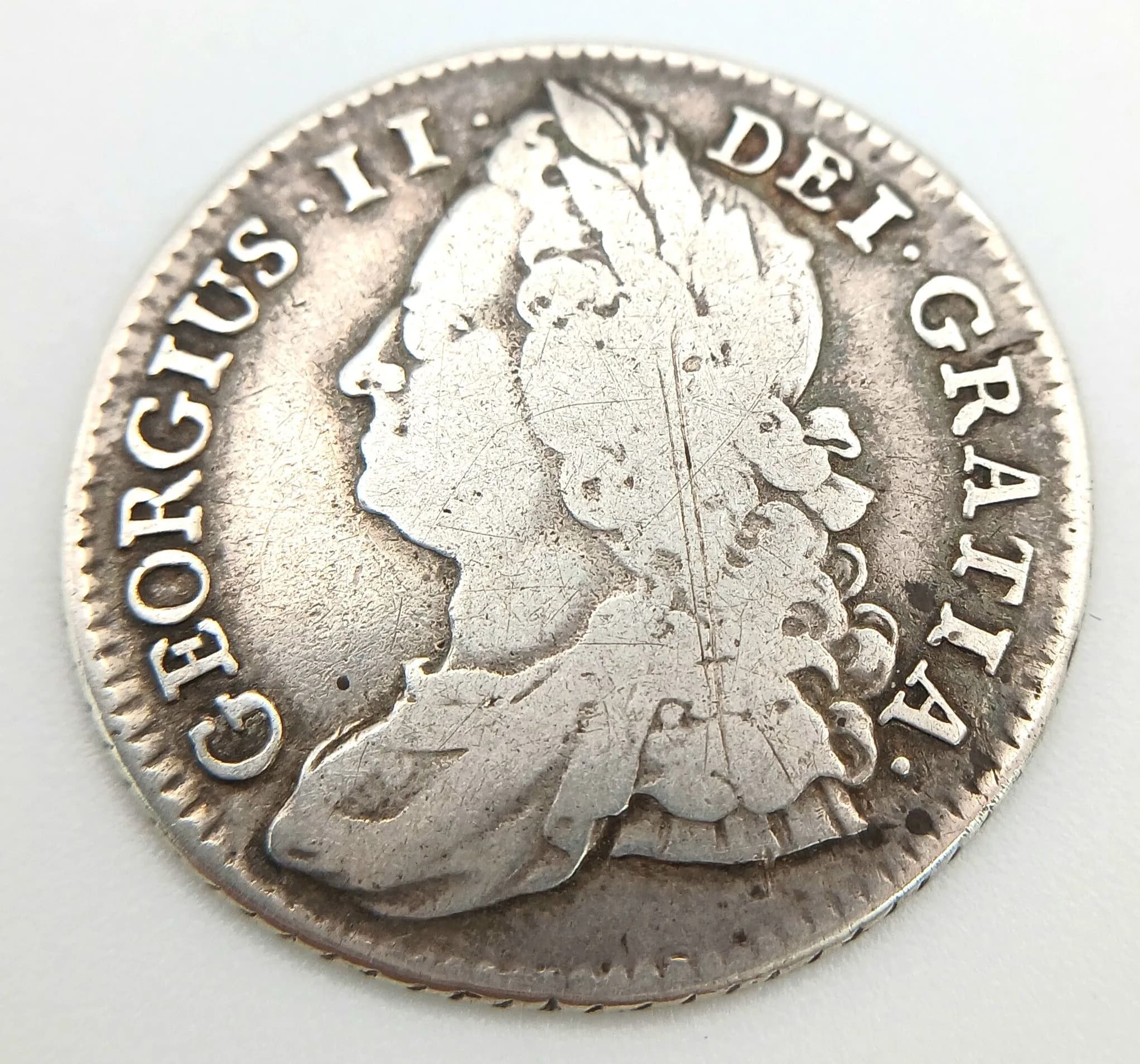 A 1743 George II Silver Shilling Coin.