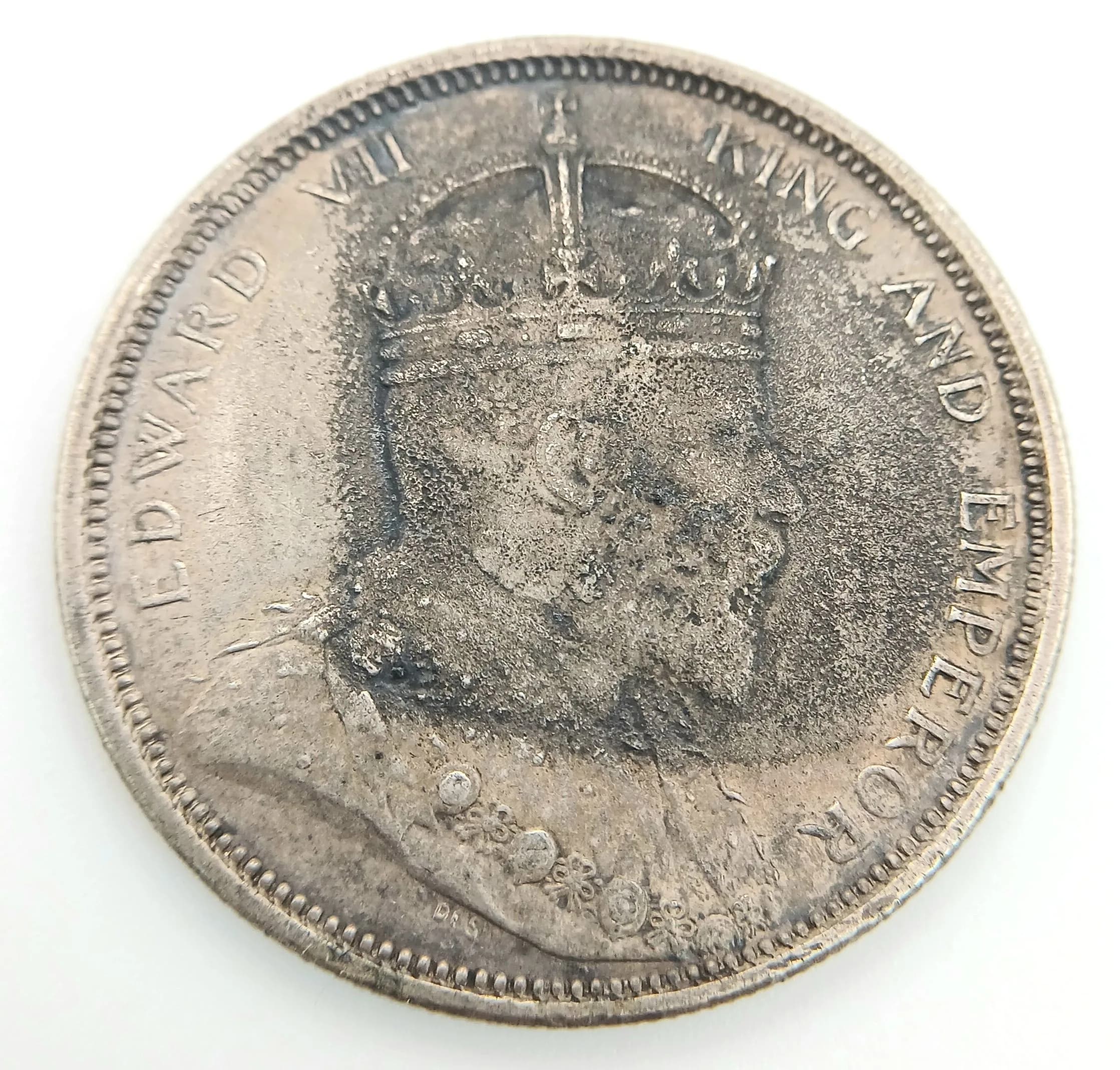 A 1903 Straits Settlements One Dollar Coin.