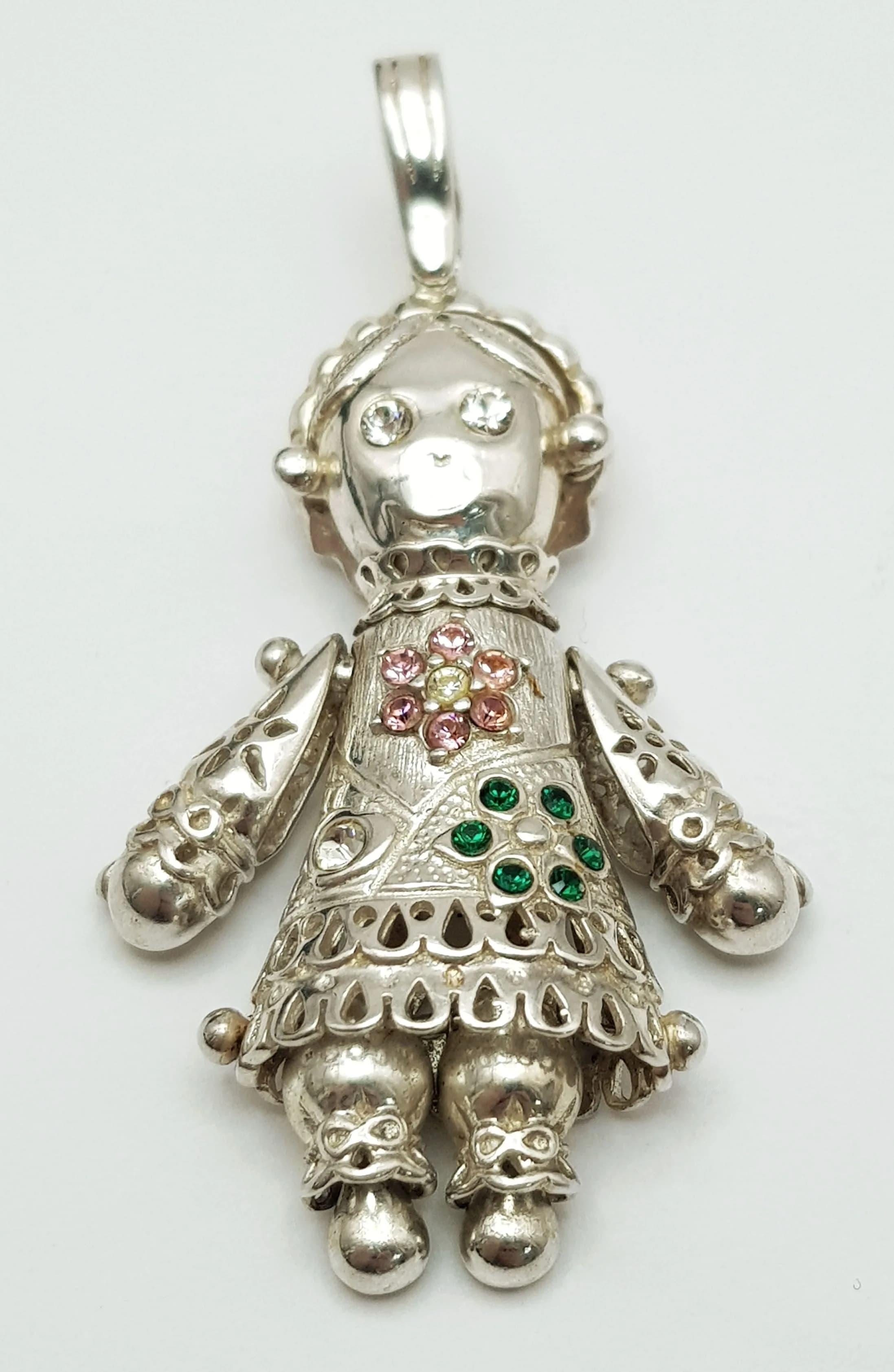 A STERLING SILVER, STONE SET, ARTICULATED, RAG DOLL, PENDANT. SIZE APPROX: 5.7cm in height x 3cm in length. 12.4G. SC 5135