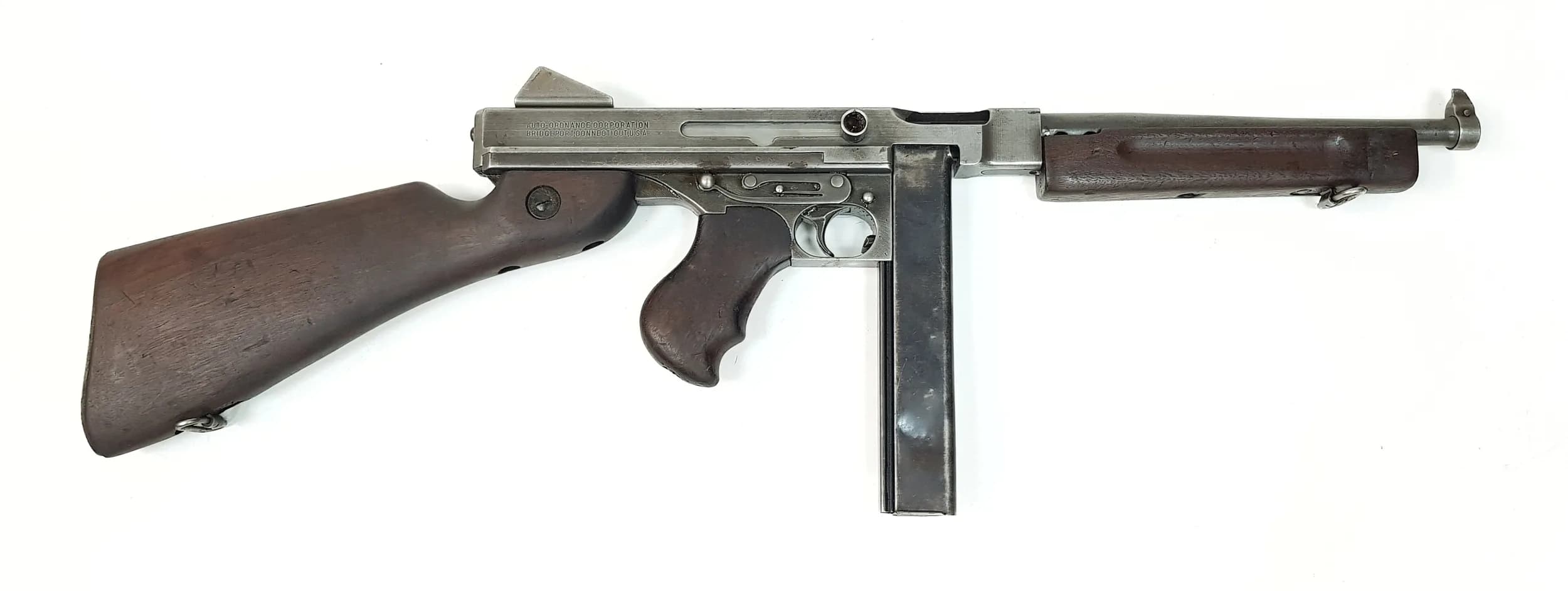 A Classic USA Deactivated Vintage Thompson M1A1 Submachine Gun. Calibre -.45 with an 11 inch barrel length. Comes with an EU deactivation certificate. EU/UK sales only - Not Holland. UK Mainland Shipping Only