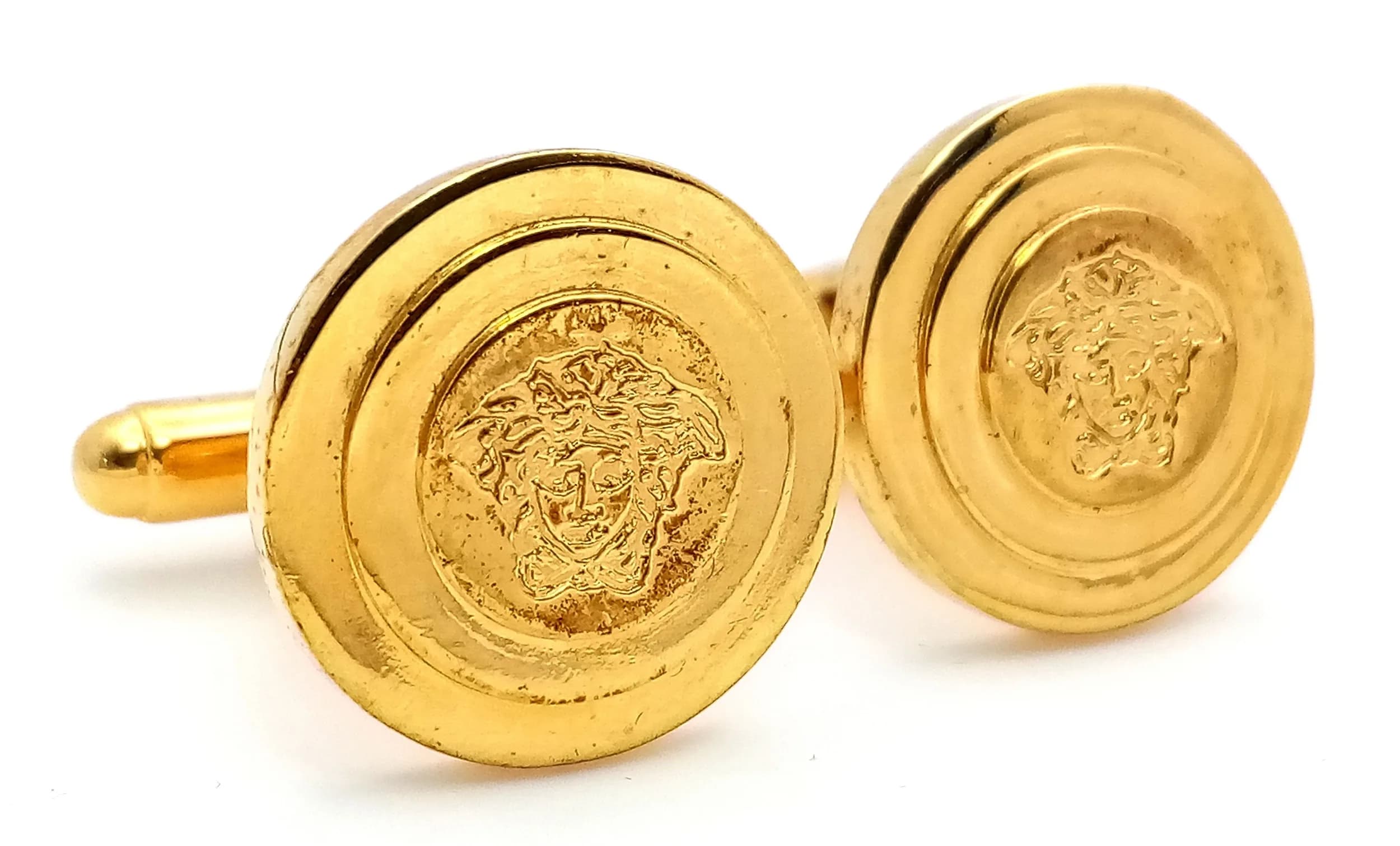 A Pair of Versace Gilded Circular Cufflinks. Original packaging. Ref: 028854.