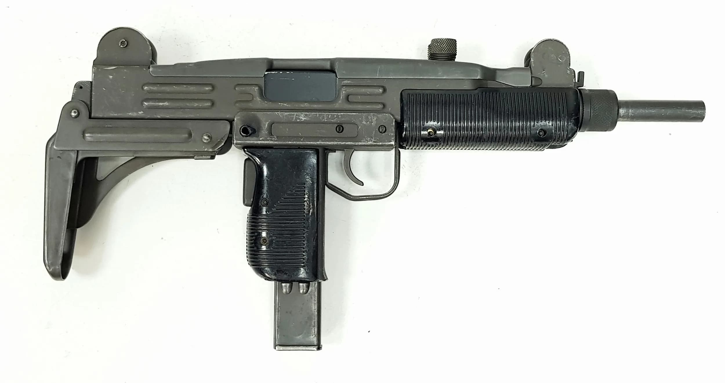 A Deactivated Israeli Uzi 9mm Sub Machine Gun. 10 inch barrel length. Comes with an EU deactivation certificate. UK/EU sales only, Not Holland. UK Mainland shipping only or arrange a courier.
