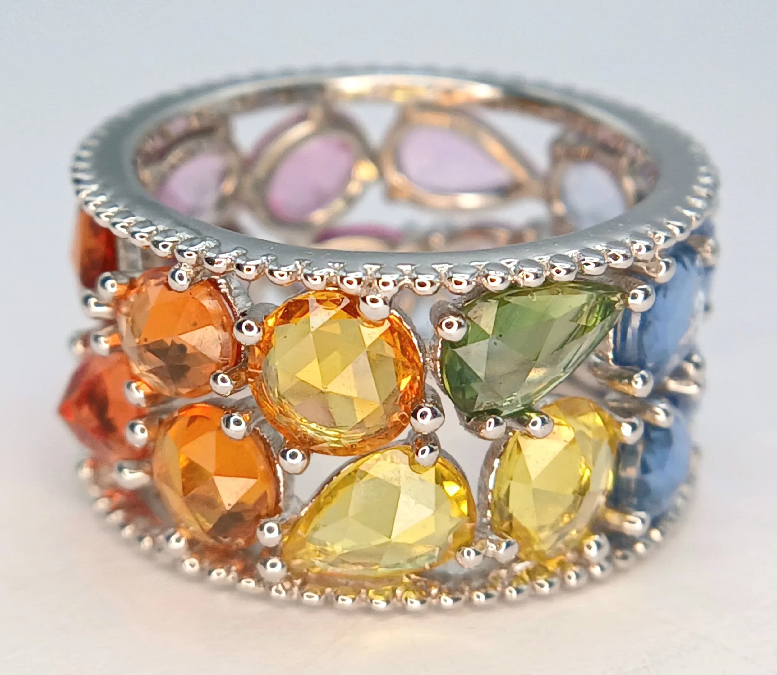 An 18K White Gold, Open Work, Gemstone Set, Band Ring. 6.6G, Size J. Sspa 4007