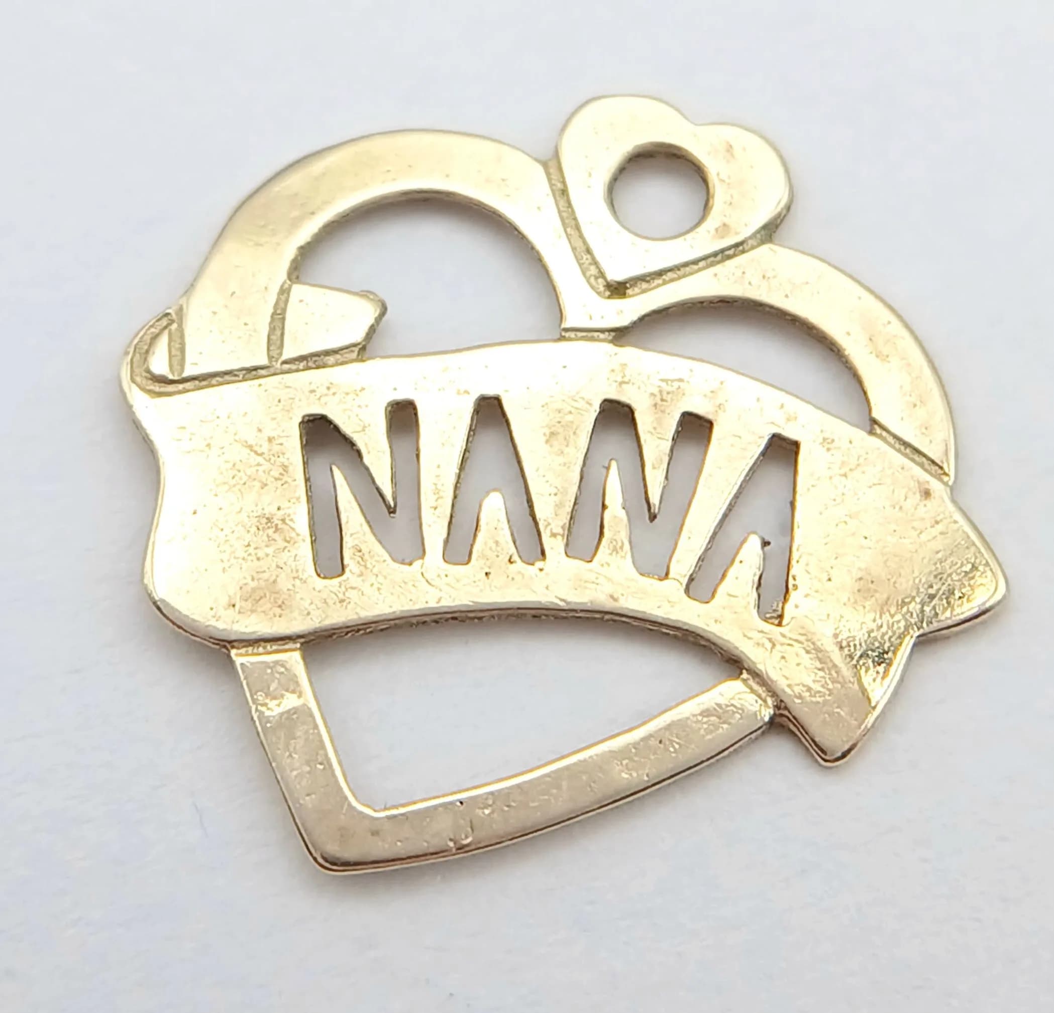 A 9K YELLOW GOLD, NANA, HEART CHARM / PENDANT. NEEDS A JUMP RING. 0.5G. SC 5052