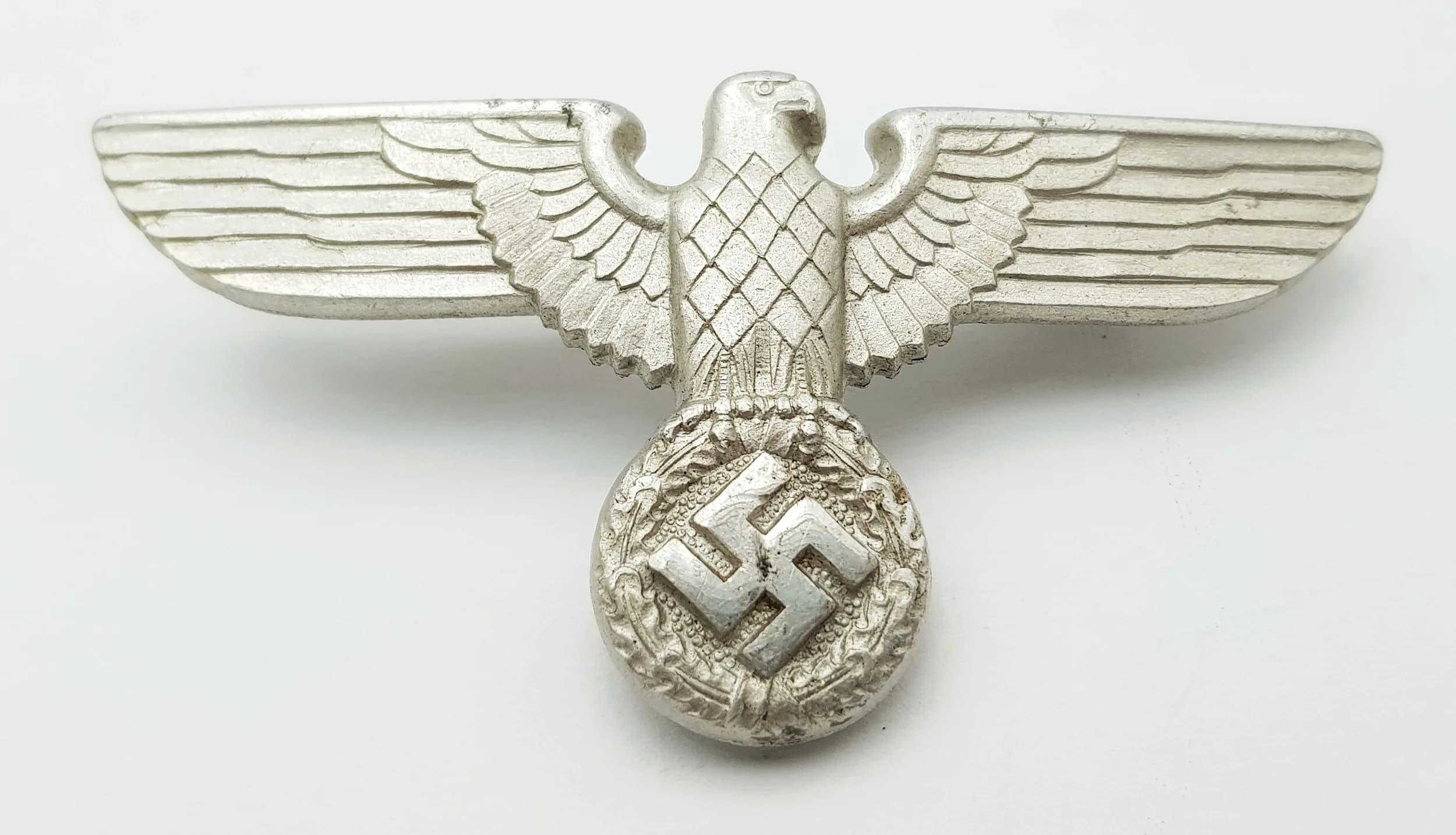 Original NAZI ERA EAGLE CAP BADGE. Reverse clearly stamped RZM (Reichszeugmeisterei) makers . Please see all pictures.