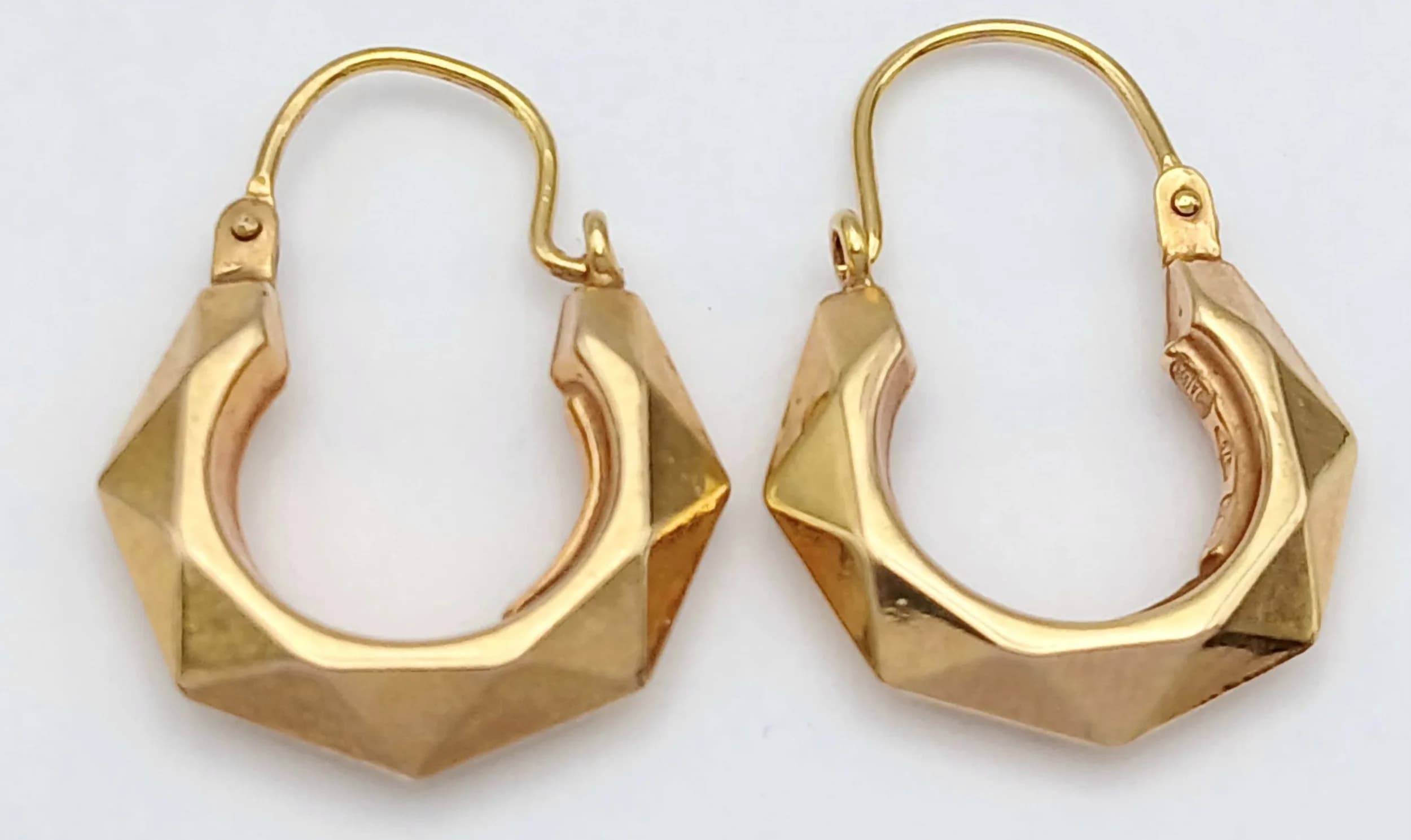 Classic Pair of 9 CARAT GOLD HOOP EARRINGS. Beautifully Faceted. Full UK hallmark. 1.4 Grams. Approx 1.5 cm Diameter. Please see pictures.