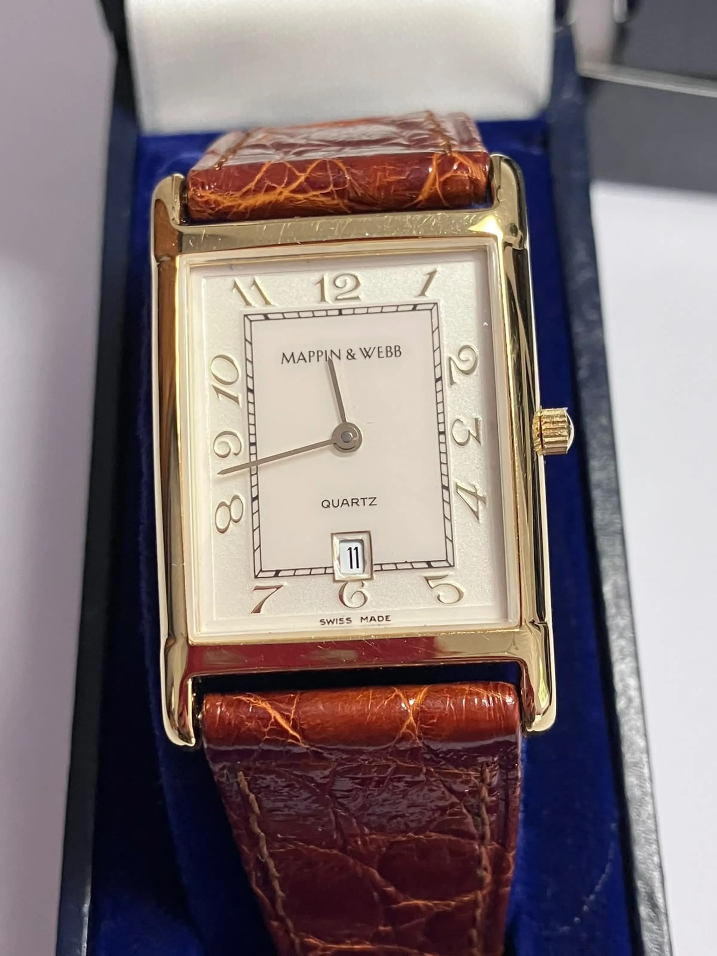 Gentleman’s Vintage MAPPIN & WEBB TANK WRISTWATCH. Brown Crocodile Strap. Quartz Movement. Complete with original box and paraphernalia. New battery recently fitted. Working order. Condition as new . Absolutely Beautiful Watch But time adjustment requires attention. af. Please see all pictures.