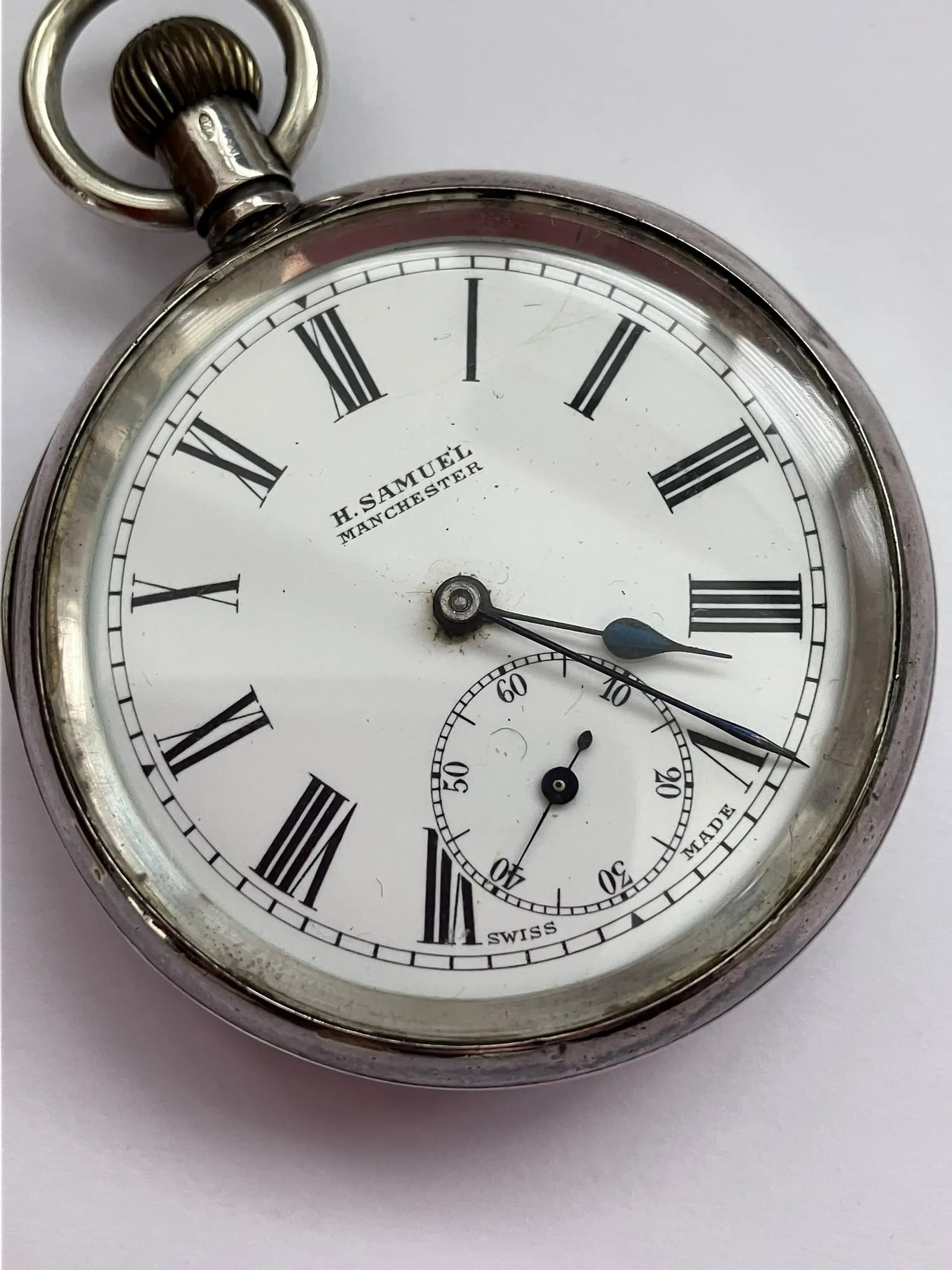 Gentleman’s Vintage SILVER POCKET WATCH by H.SAMUEL. Fully hallmarked. Roman numerals with secondary seconds dial. Full Working order. Case has Signs of use. Face is in Perfect Condition . Please see pictures.
