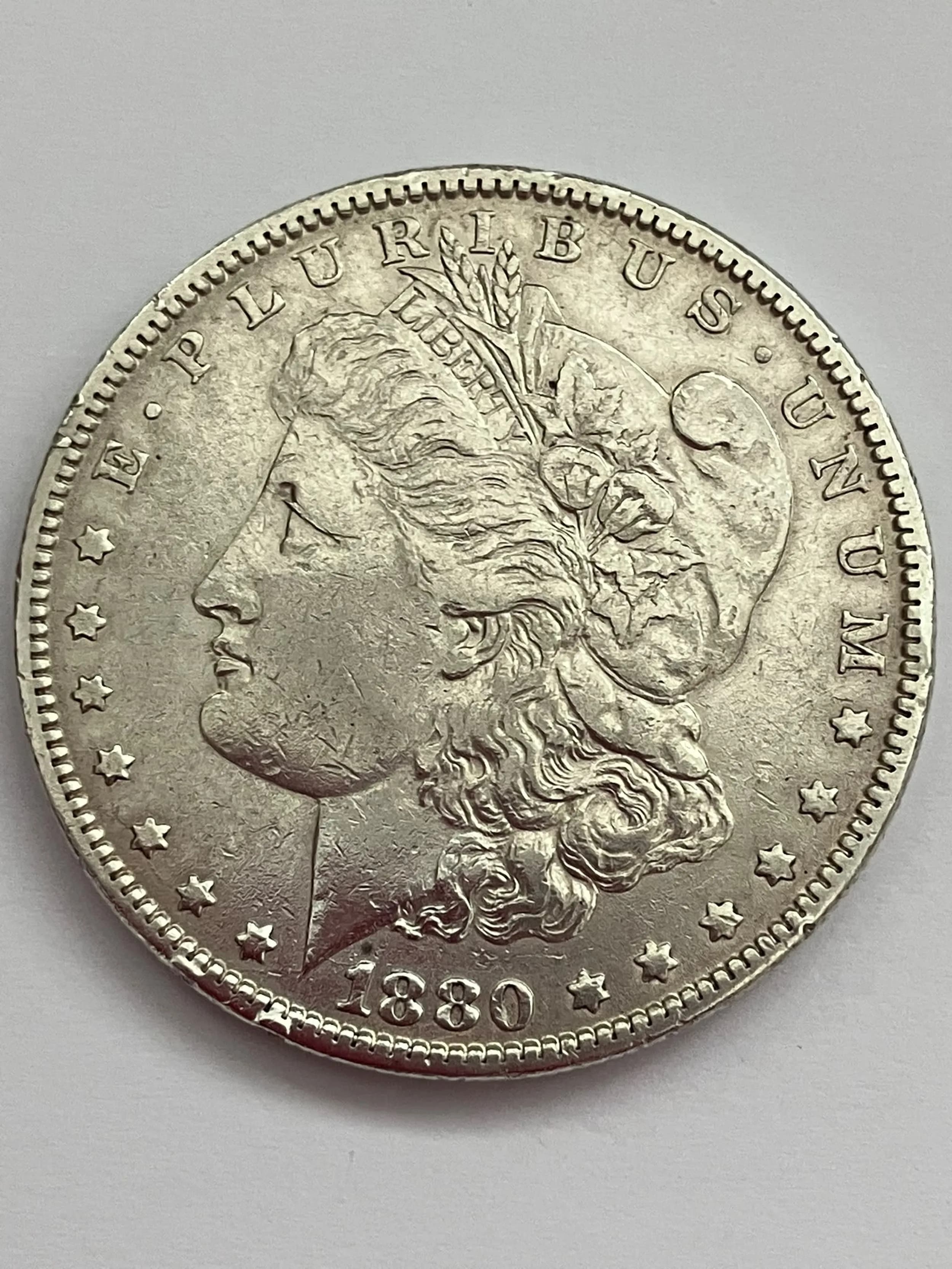 1880 USA MORGAN SILVER DOLLAR coin. Very fine Condition . New Orleans Mint.