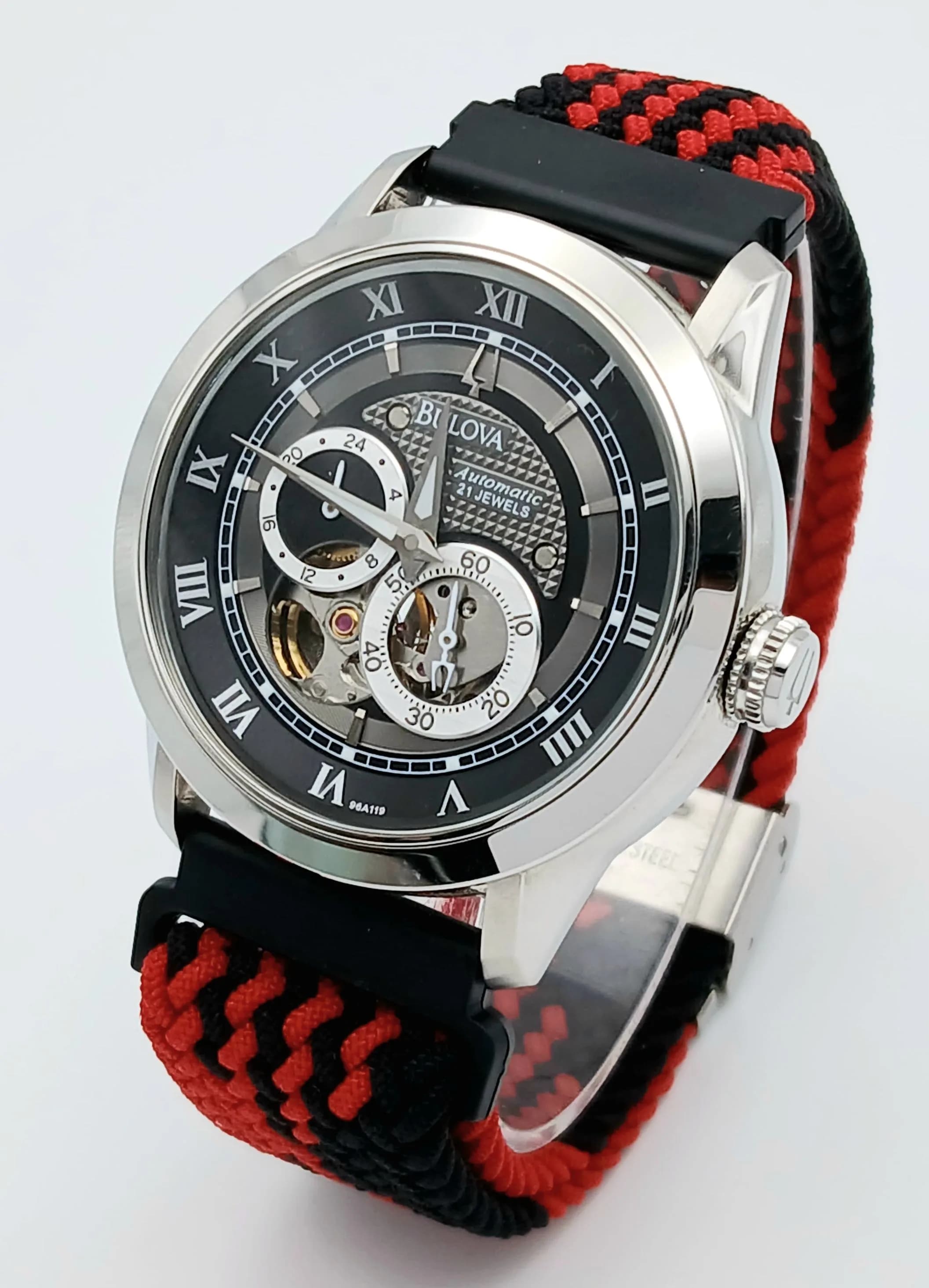 A Very Good Example, Bulova 21 Jewel Automatic Open Heart Dial/Exhibition Back Watch-41mm Case. Ref. C8601037C. Flex Weave Fully Adjustable Strap and Comes with Original Stainless-Steel Strap.
