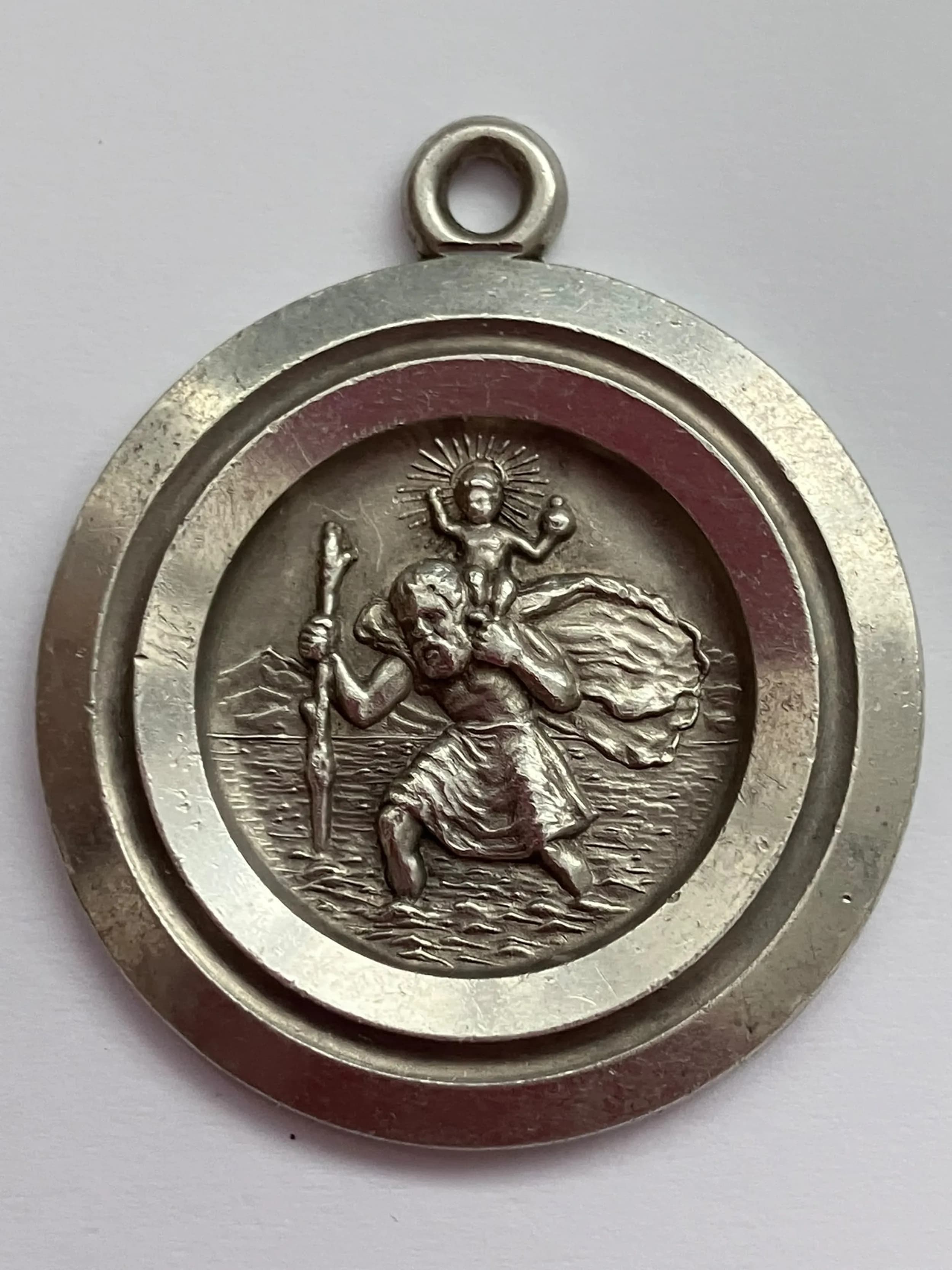 Vintage SOLID SILVER SAINT CHRISTOPHER MEDALLION. Full UK hallmark. Lovely raised detail. 15 Grams. Approx 3 cm Diameter. Please see pictures.