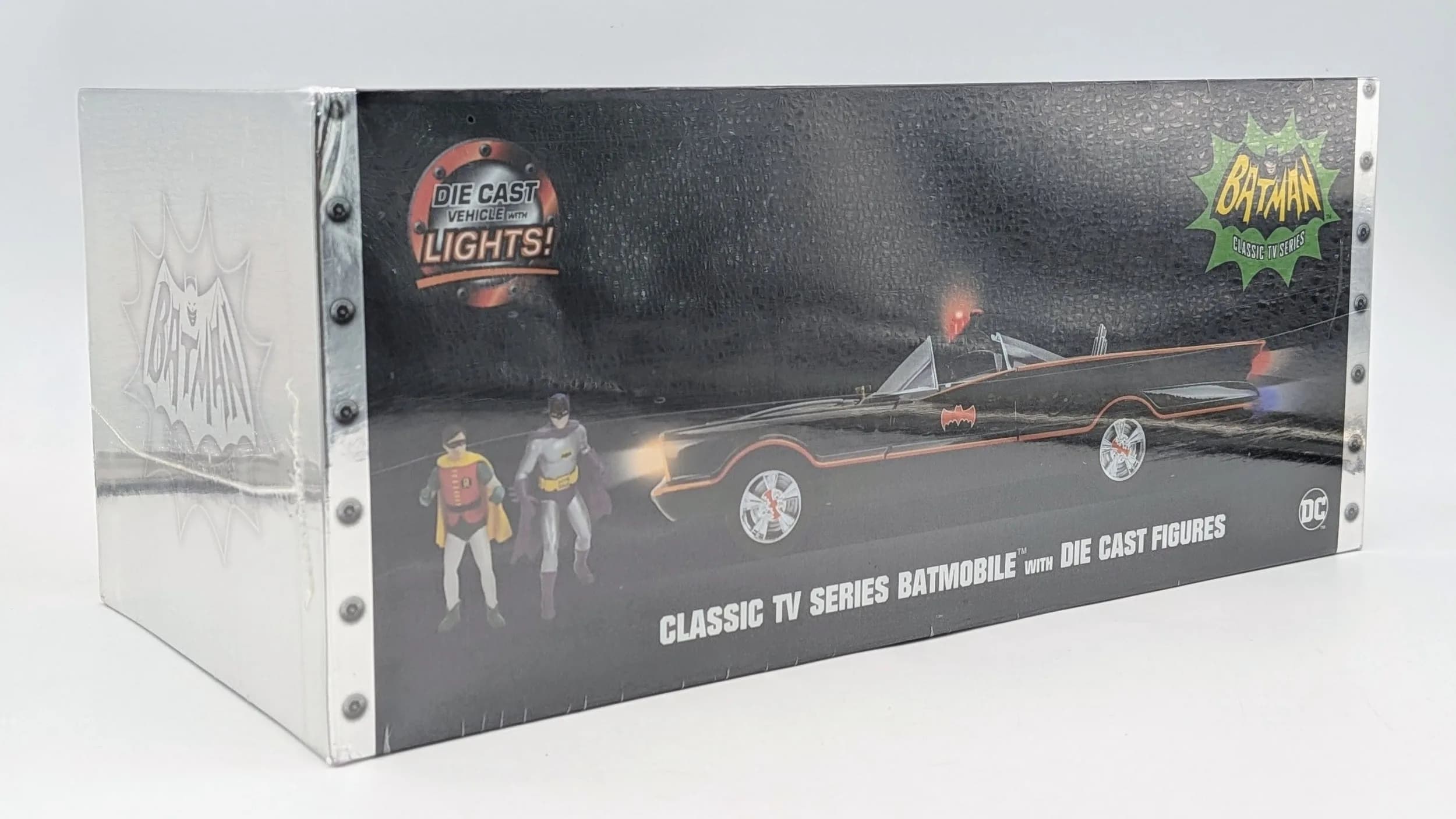 A Jada toys 1/18th scale classic TV series Batmobile with die cast figures & working lights. As new, still factory sealed.