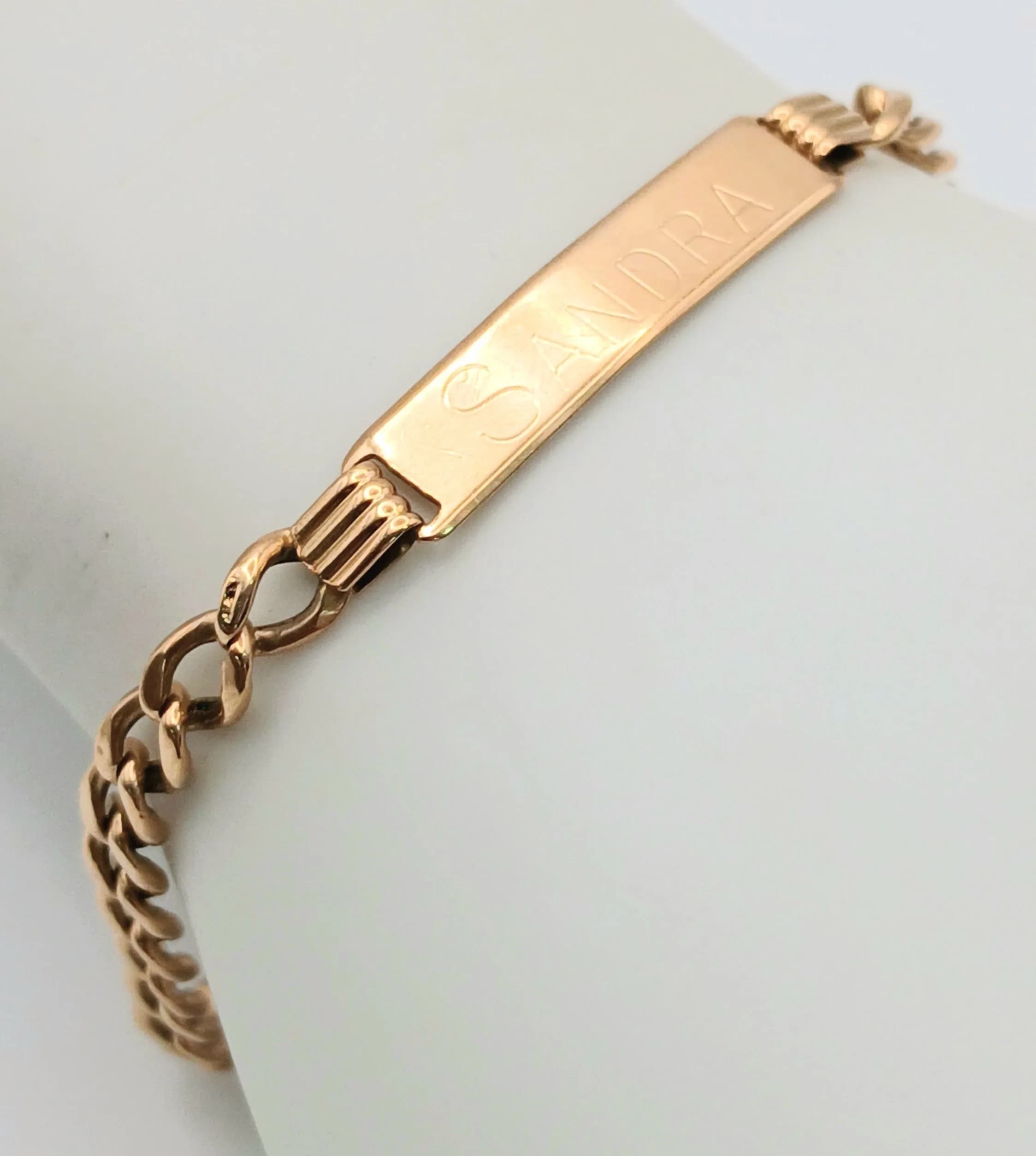 A 9K Yellow Gold Identity Bracelet. If your name is Sandra, it's your lucky day! 4g. 18cm.
