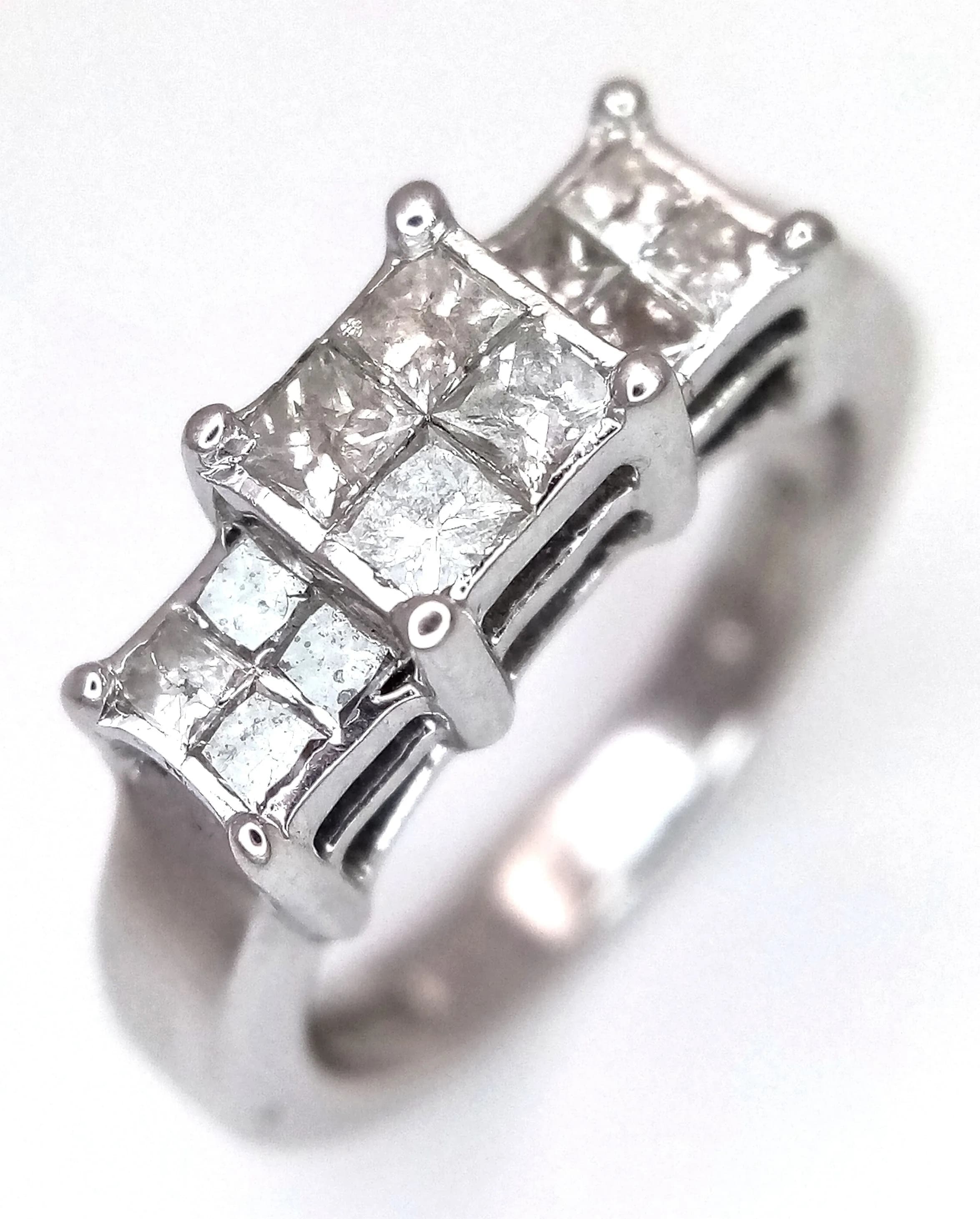AN 18K WHITE GOLD, PRINCESS CUT DIAMOND, CLUSTER RING. 0.50CTW. 5.1G, SIZE H. SC 6073