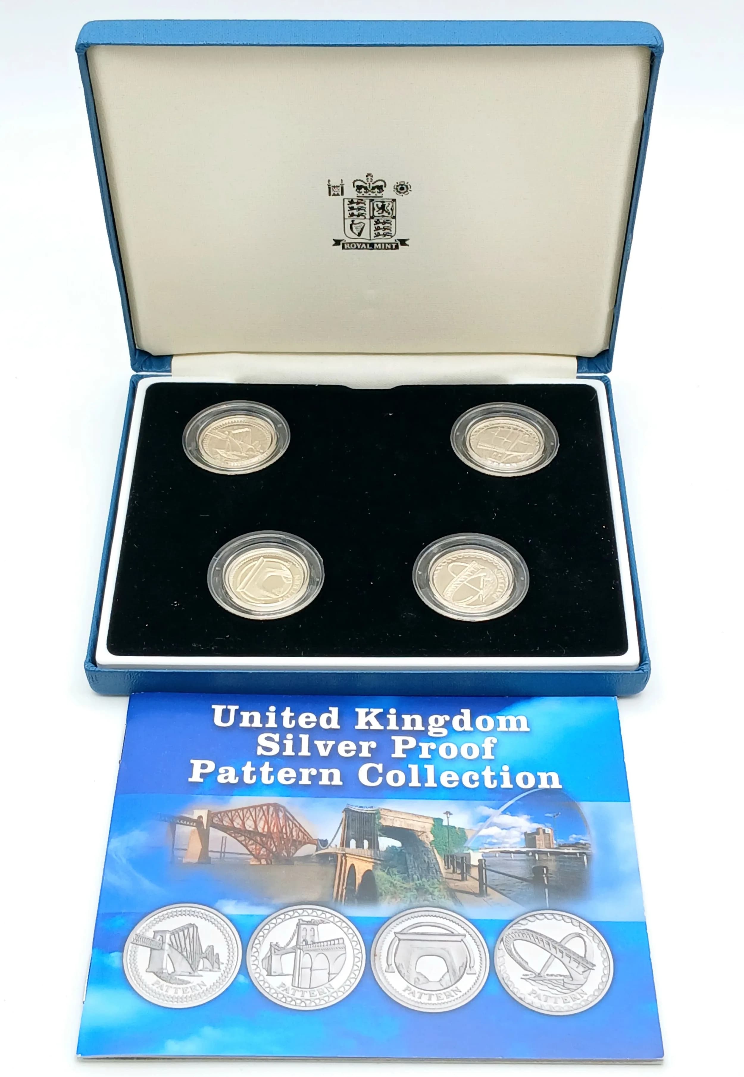 A Royal Mint United Kingdom Sterling Silver Proof Commemorative Four Bridge Coin Set. Encapsulated with COAs and case. 38g total.