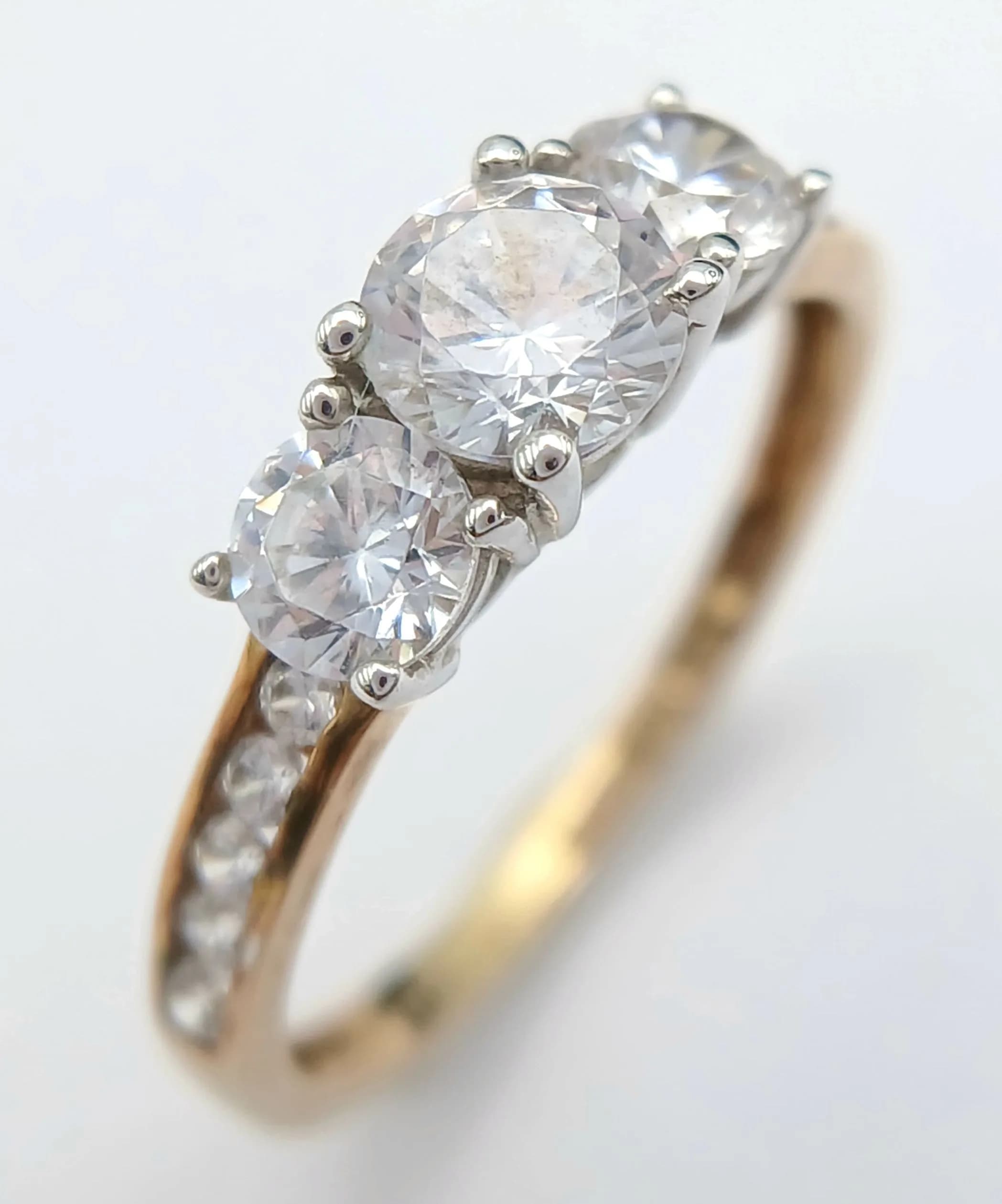 A 9K YELLOW GOLD, 3 STONE, DRESS RING. 1.6G, SIZE L. SC 6042