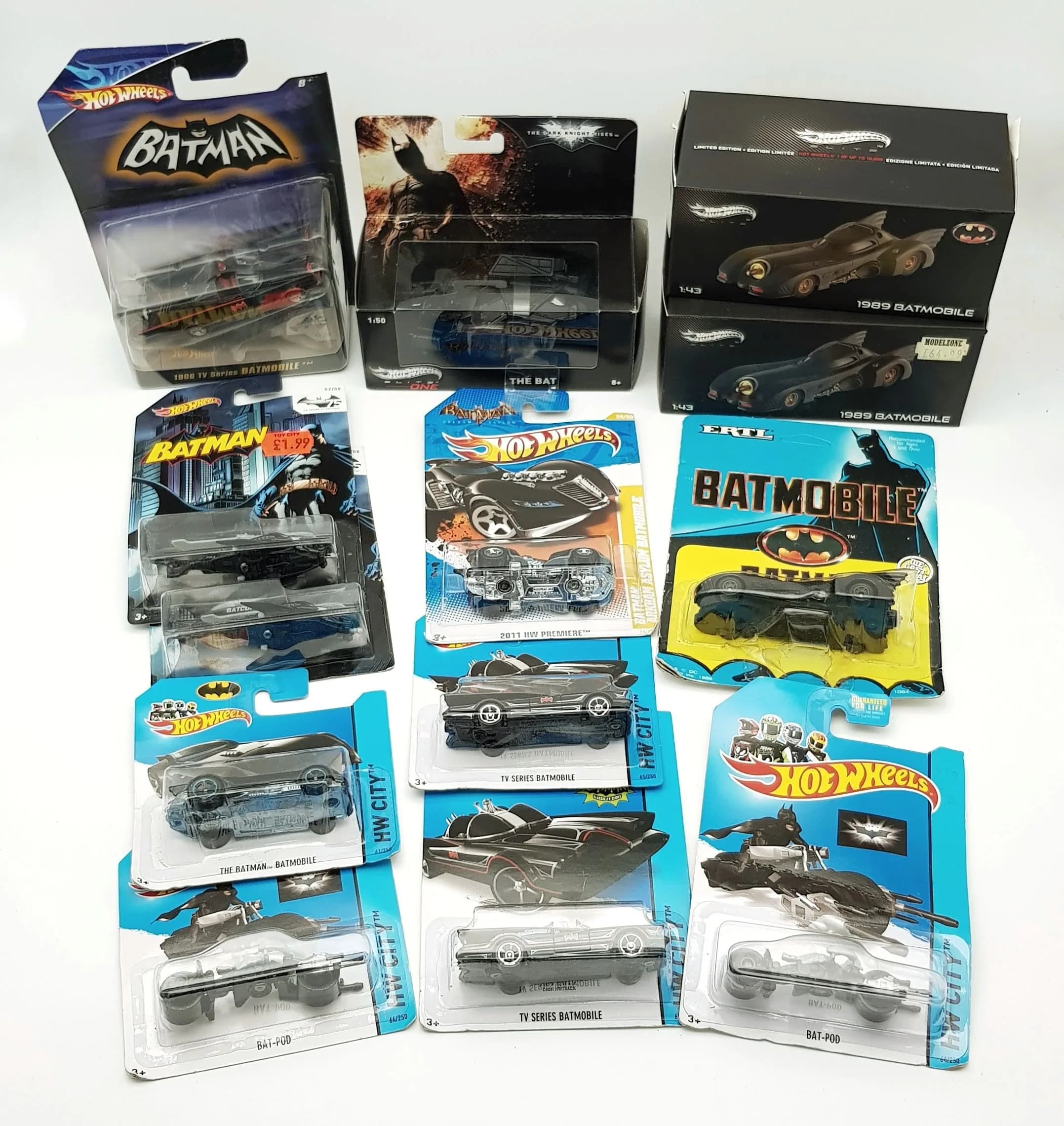 A collection of Hotwheels Batman vehicles. All on their backing cards and in boxes. Good condition. To include three Hotwheels Elite 1/43 scale models.