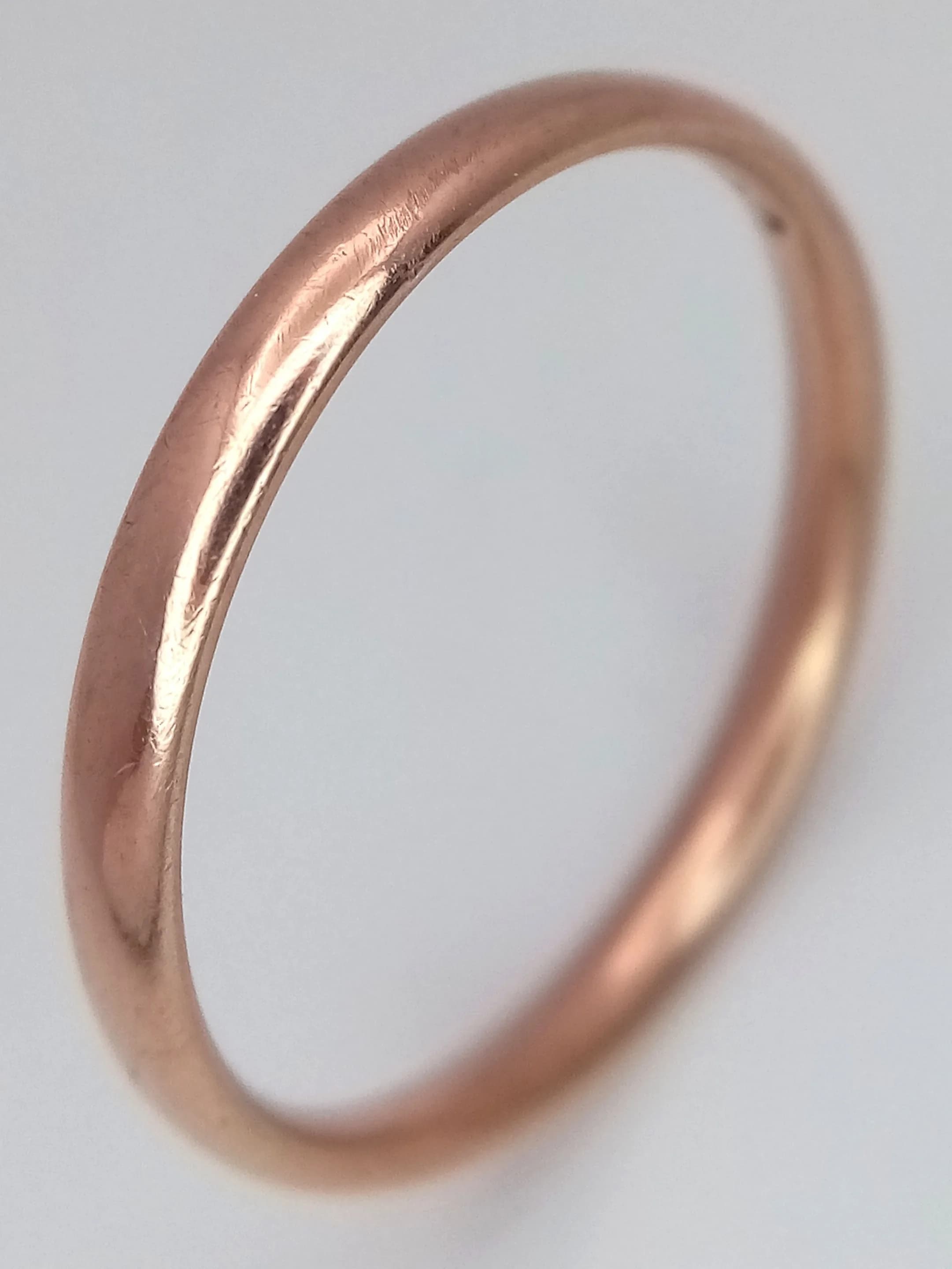 A 9K Rose Gold (tests as) Band Ring. 3mm width. Size R 1/2. 1.9g.