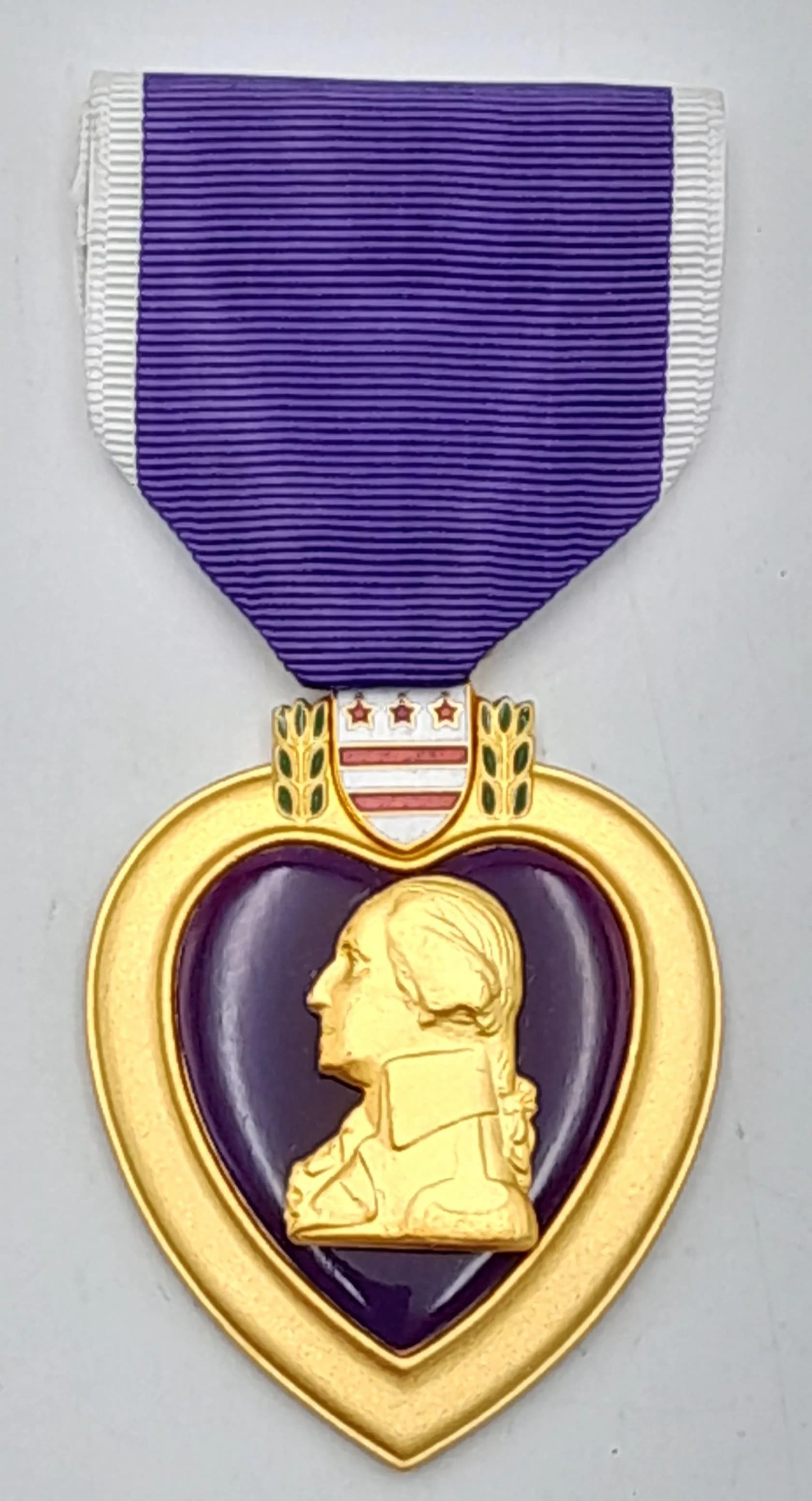 Current Issue Purple Heart Medal. Made by Graco Awards Ltd some time from 1999 to the present day. Most likely Iraq or Afghanistan theatre.