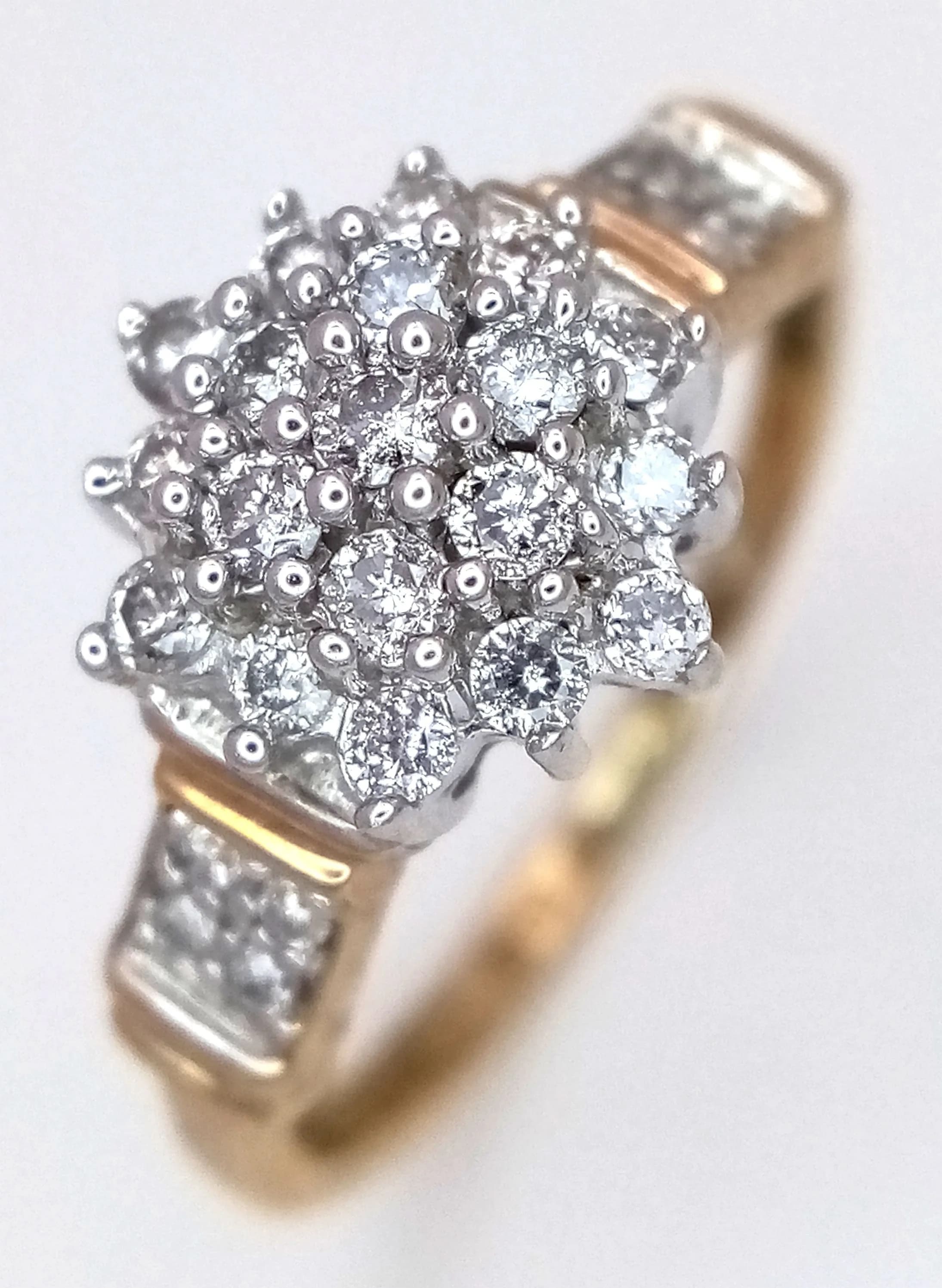 A 9K YELLOW GOLD, DIAMOND SET, CLUSTER RING. 0.50CTW. 2.2G, SIZE N. SC 6005