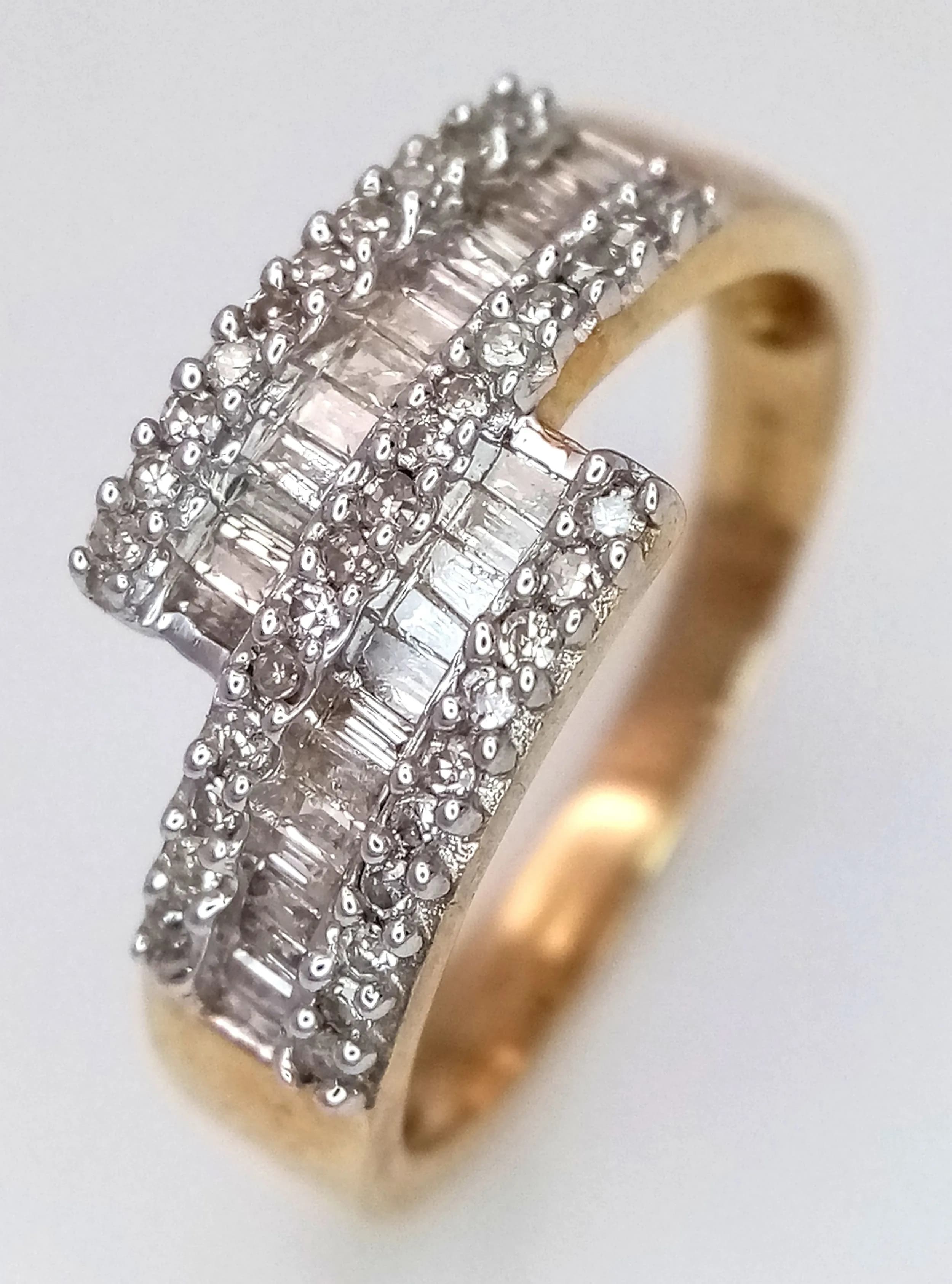 A 9K YELLOW GOLD, MIXED CUT, DIAMOND SET, 5 ROW, CROSSOVER DESIGN RING. 0.50CTW. 3.5G, SIZE Q. SC 6009
