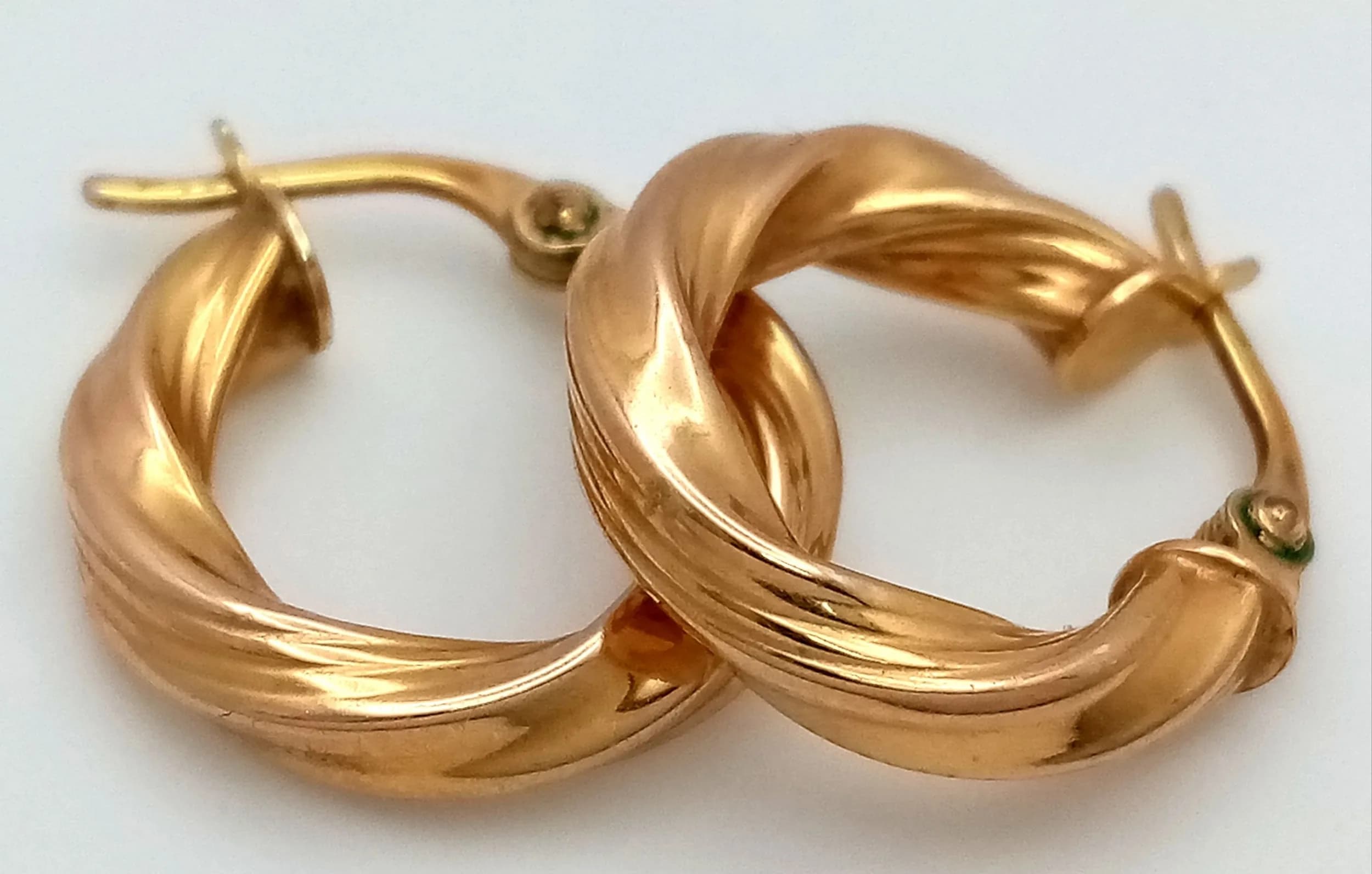 A Pair of 9K Yellow Gold Small Twist Hoop Earrings. 17mm. 1.8g total weight.