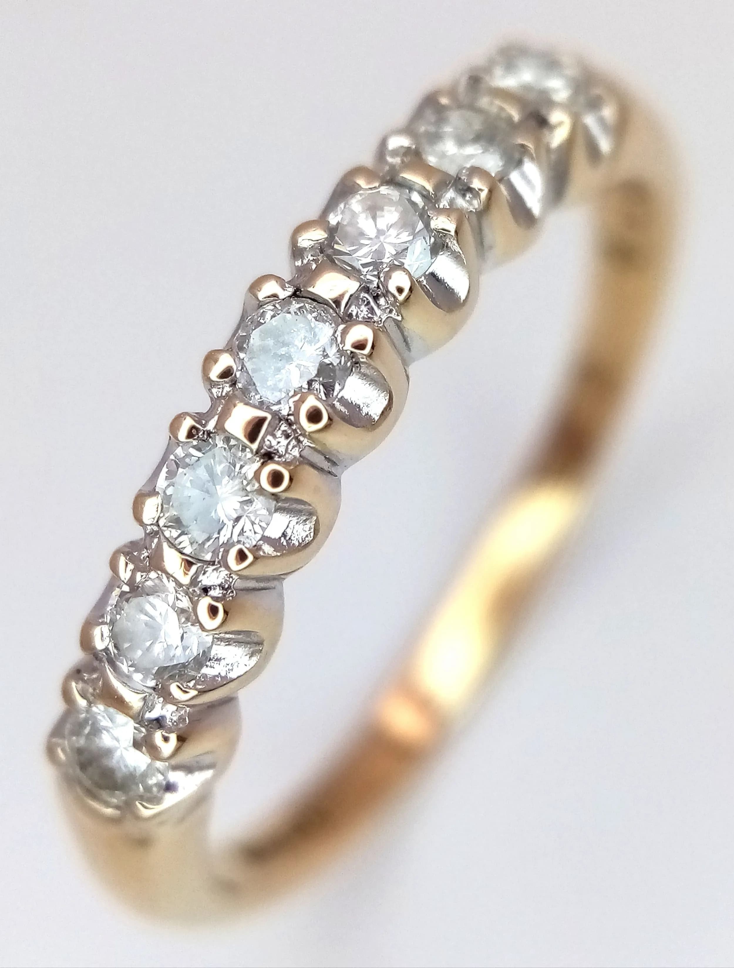 A 9K YELLOW GOLD, DIAMOND SET, HALF ETERNITY RING. 0.33CTW. 2.3G, SIZE R. SC 5017
