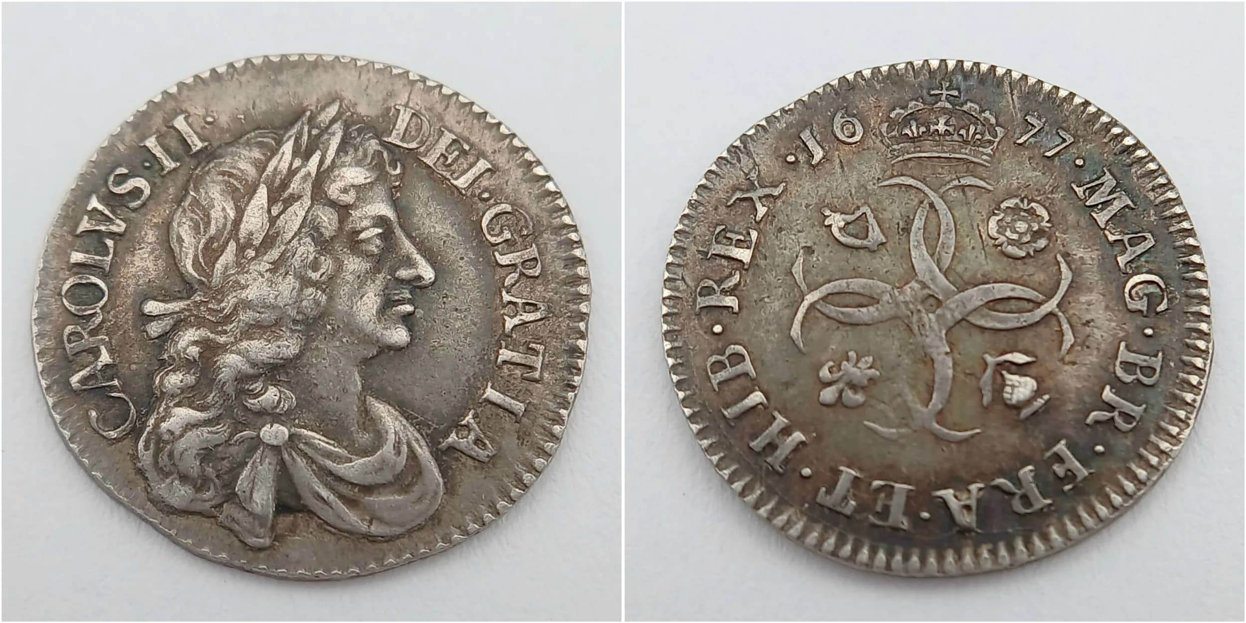 An Extremely Fine Condition 1677 British Silver 4 Pence Coin. Graded on the Sheldon Scale XF-45. 2 grams.