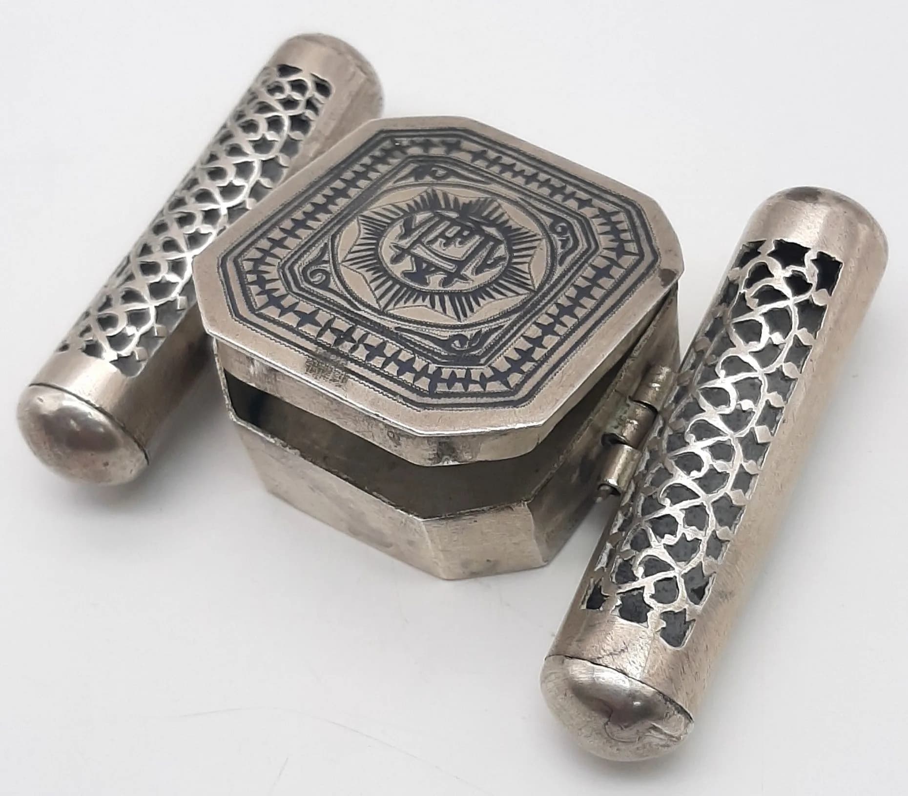 A VINTAGE NIELLO SILVER KORAN ARM BAND HOLDER. 101.2gms