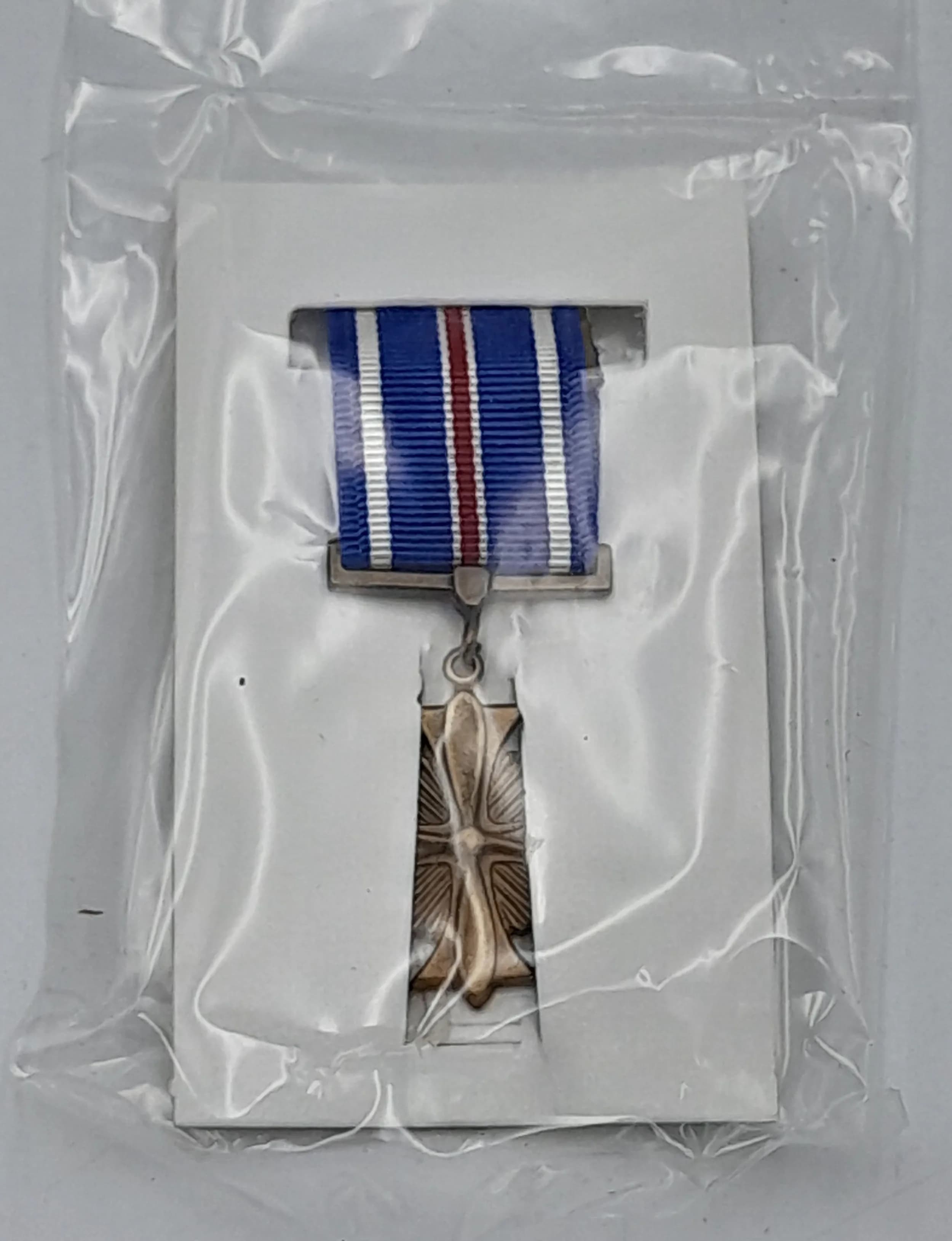 Vietnam War Era Unissued Distinguished Flying Cross Miniature Medal in Original Box.