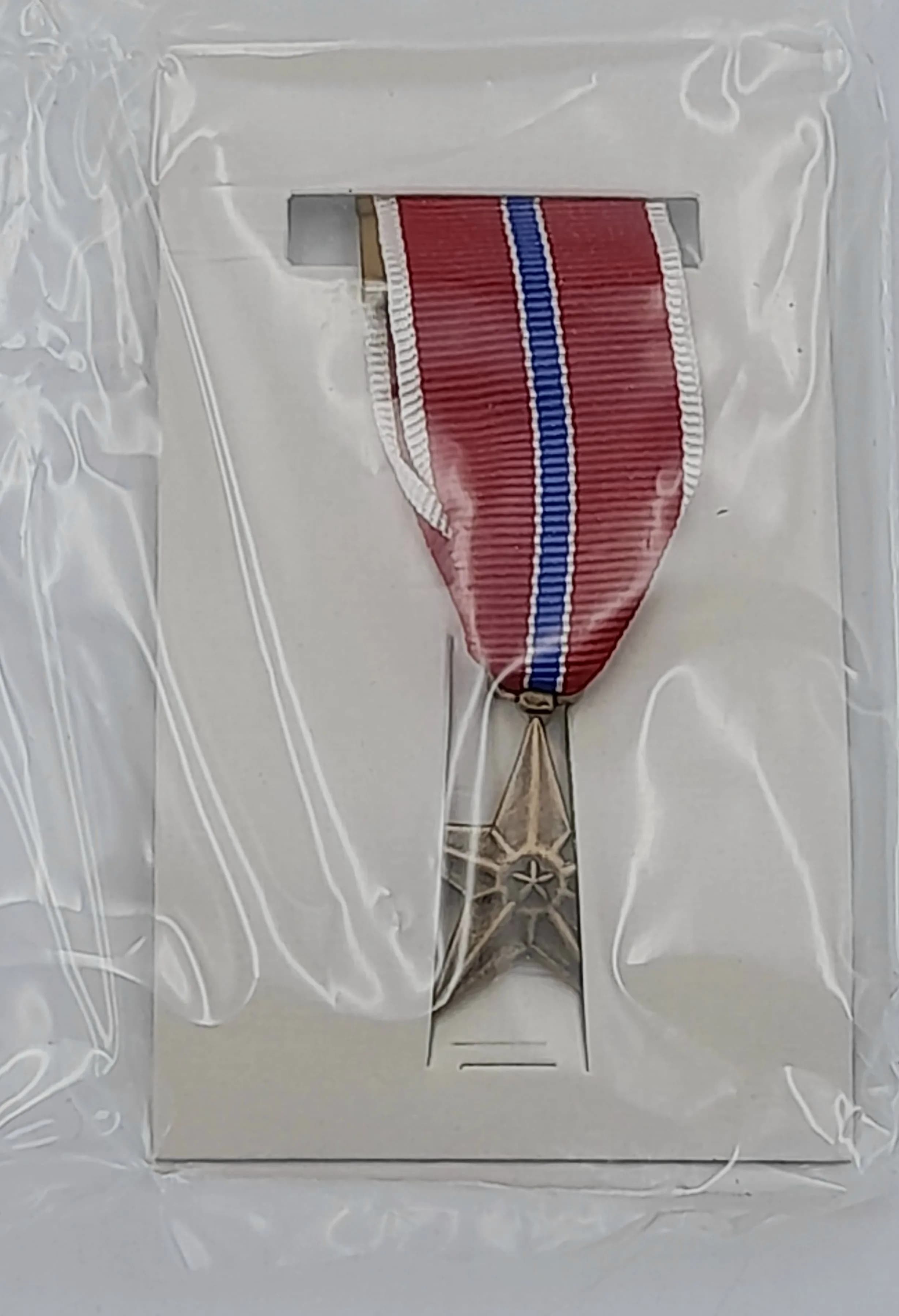 Vietnam War Era Unissued Bronze Star Miniature Medal in Original Box.
