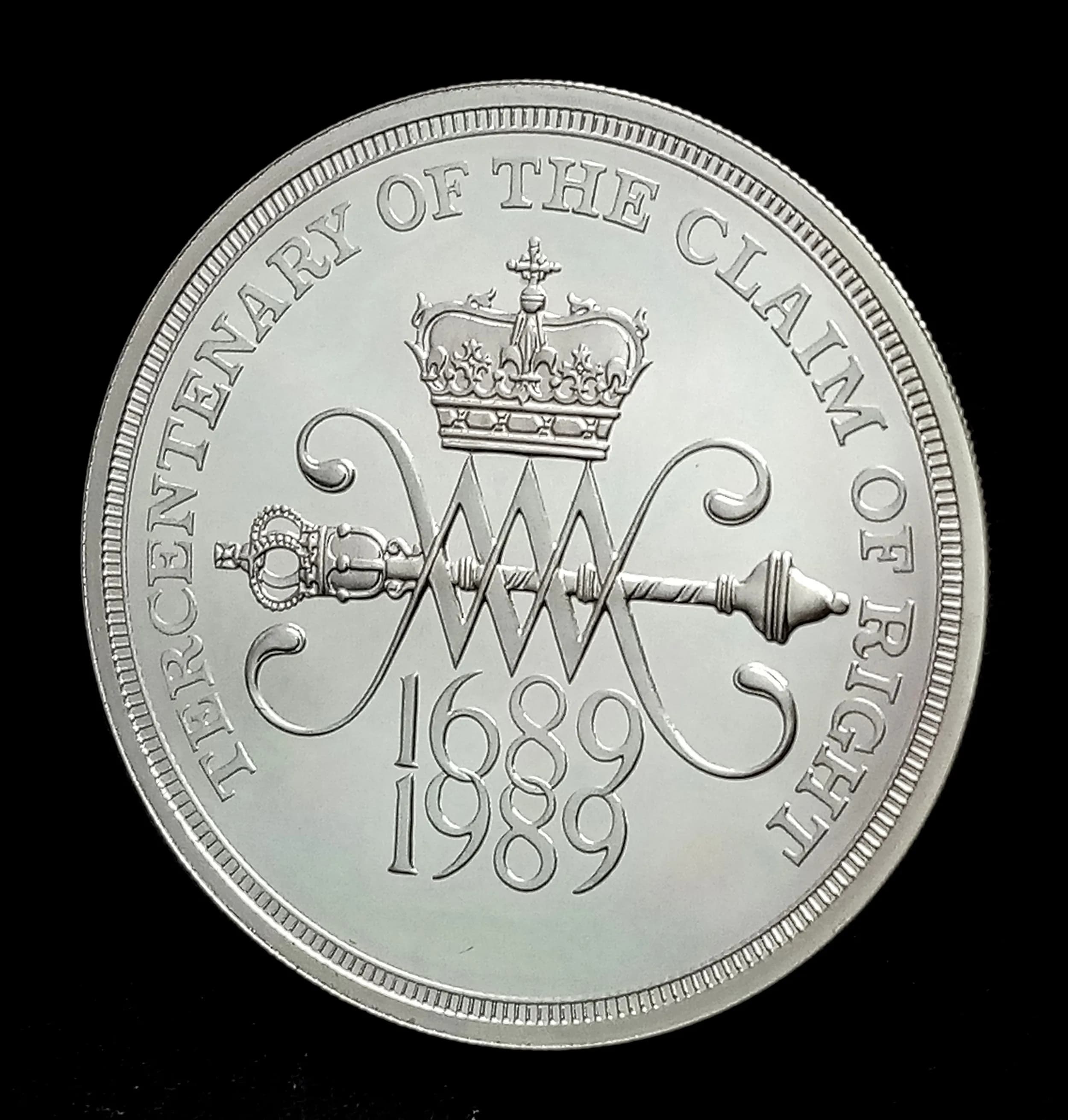 A Royal Mint Sterling Silver £2 Proof Coin - Commemorating the Tercentenary of the Claim of Right. Encapsulated with COA and case. 15.98g.