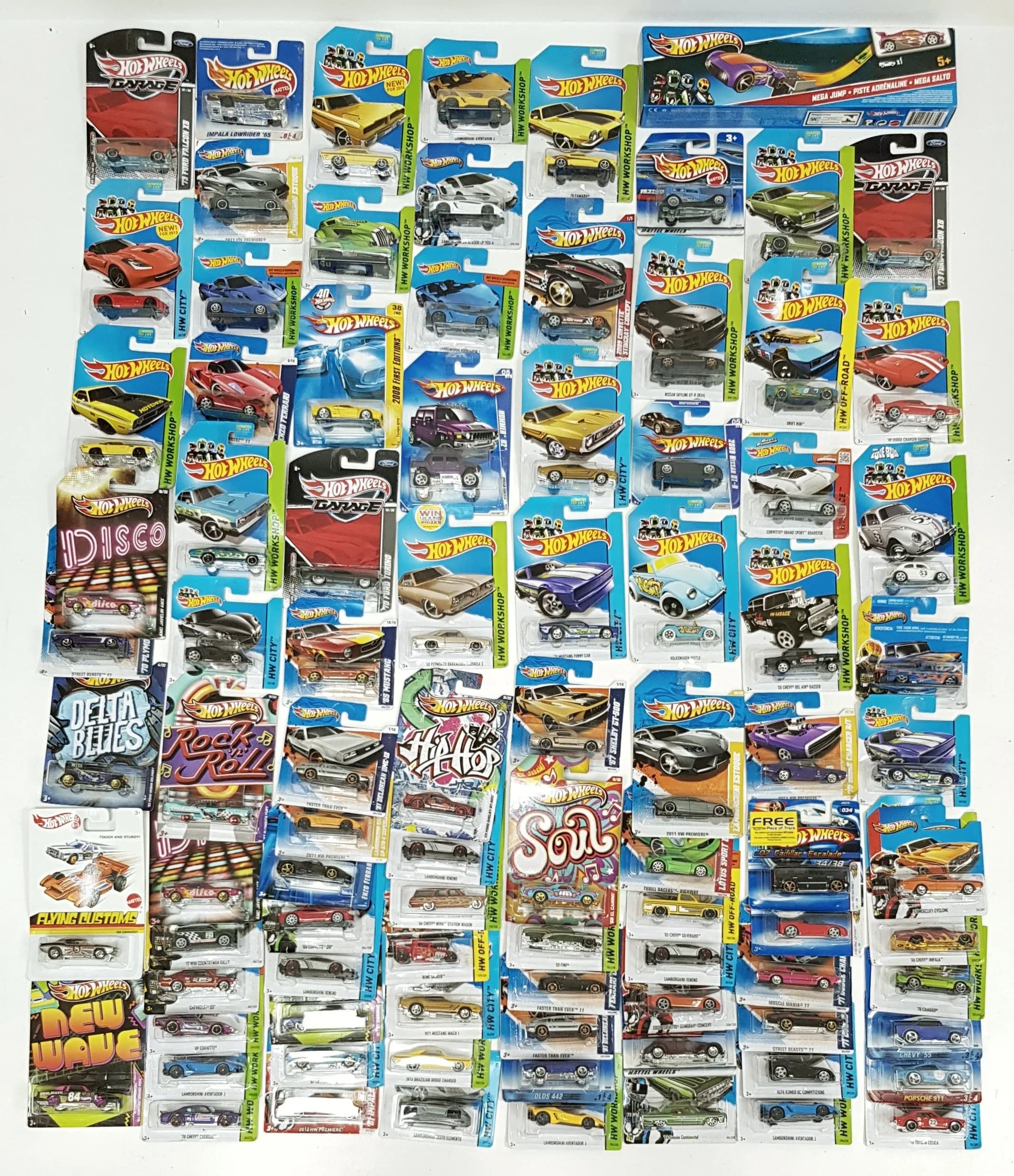 A collection of Hotwheels cars. Still on their backing cards. Comes with a boxed track & car set. Good condition.