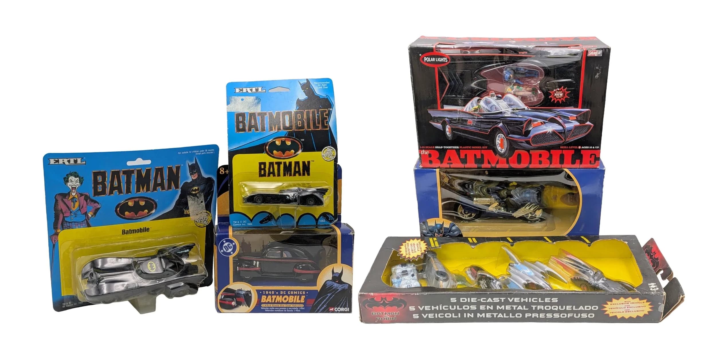 A collection of Batman die cast vehicles. Including Corgi & ERTL. All in boxes and blister packs. Good condition.