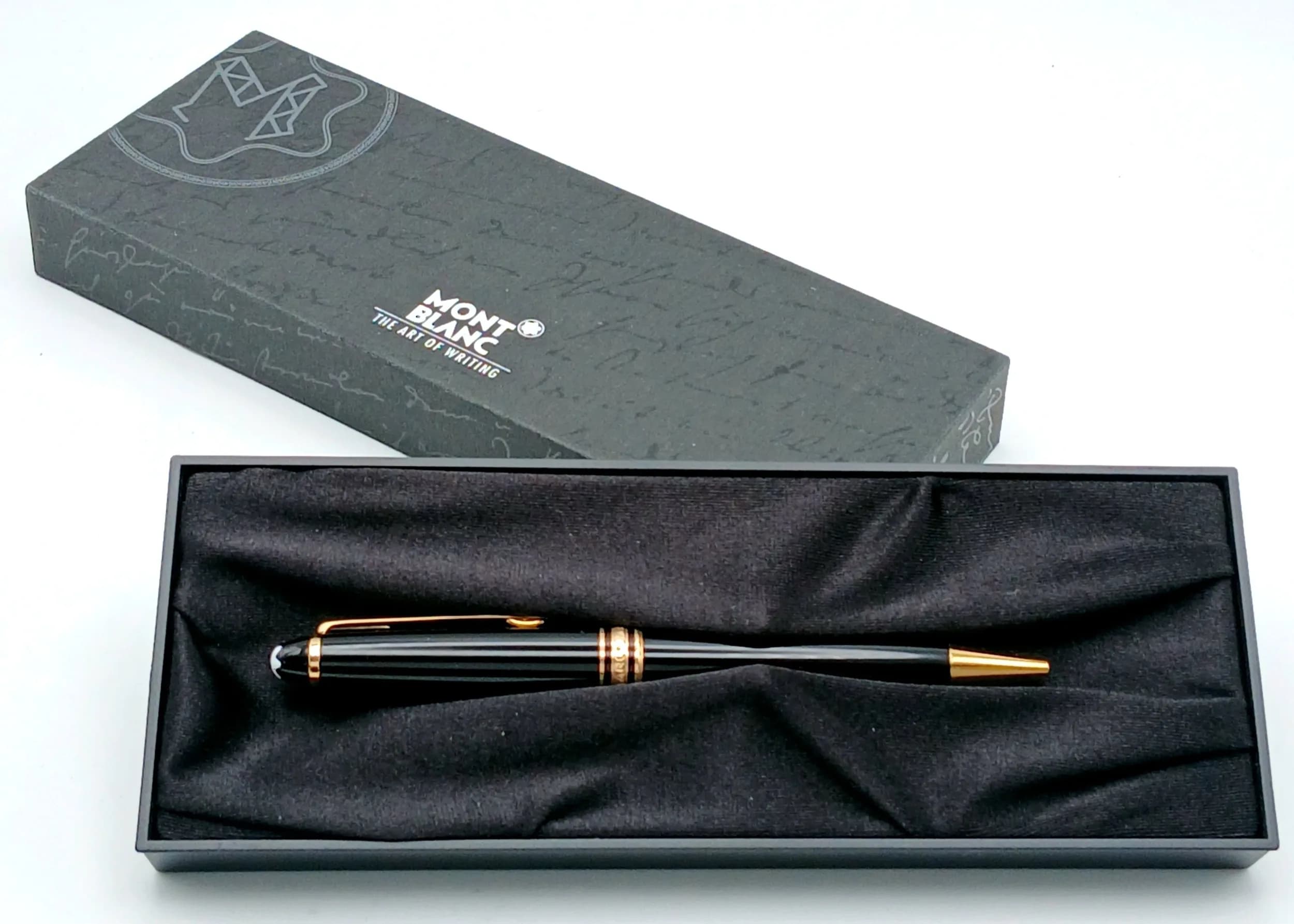A Montblanc Meisterstück Ballpoint Pen. Black precious resin with gold-tone trim and the signature Montblanc emblem. Comes with a Guarantee Certificate, care booklet and original box. Measures approx. 14cm in length. In good condition. Please see photos or request a condition report. Ref: 29511.
