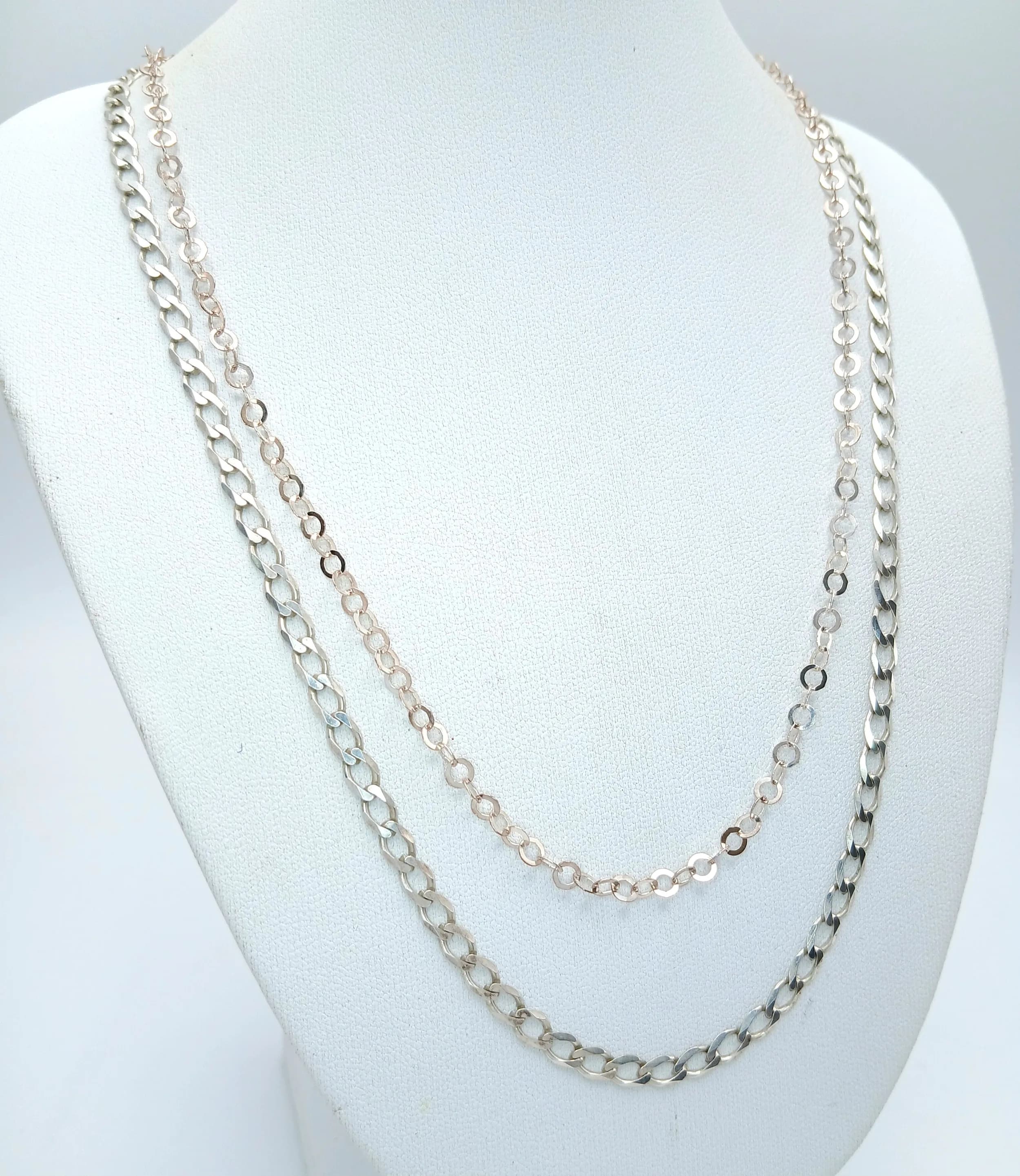 ITALIAN SILVER CHAIN LINK NECKLACE (48 cm) Together with an ITALIAN SILVER CURB CHAIN NECKLACE (50 cm). 10