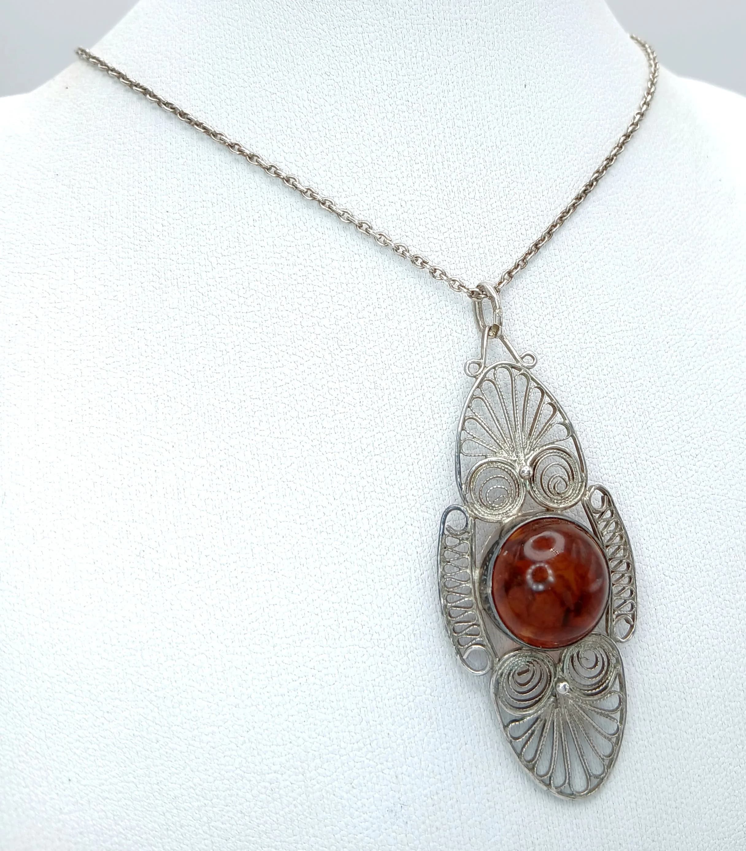 Large SILVER FILIGREE PENDANT with AMBER CABOCHON. Mounted on a SILVER CHAIN LINK NECKLACE. Pendant x 5 cm. Silver Necklace x 50 cm. Please see pictures.