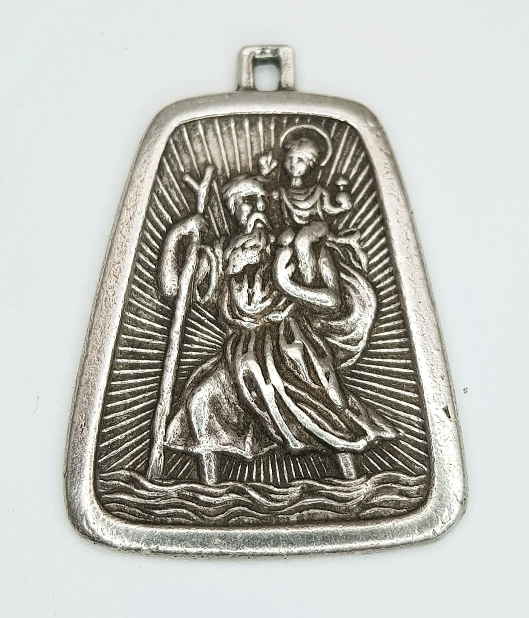 A Sterling Silver St. Christopher Medallion Pendant. Approx 3.4cm x 2.5cm. Total weight: 8.64g.